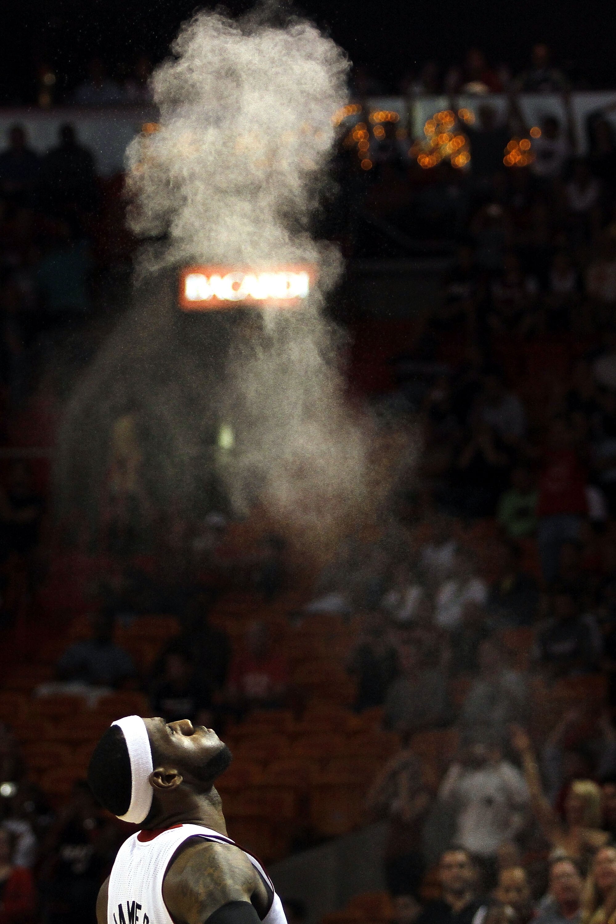 MIAMI - OCTOBER 18:  Forward LeBron James #6 of the Miami Heat prepares to face the Charlotte Bobcats on October 18, 2010 at American Airlines Arena in Miami, Florida. NOTE TO USER: User expressly acknowledges and agrees that, by downloading and/or using