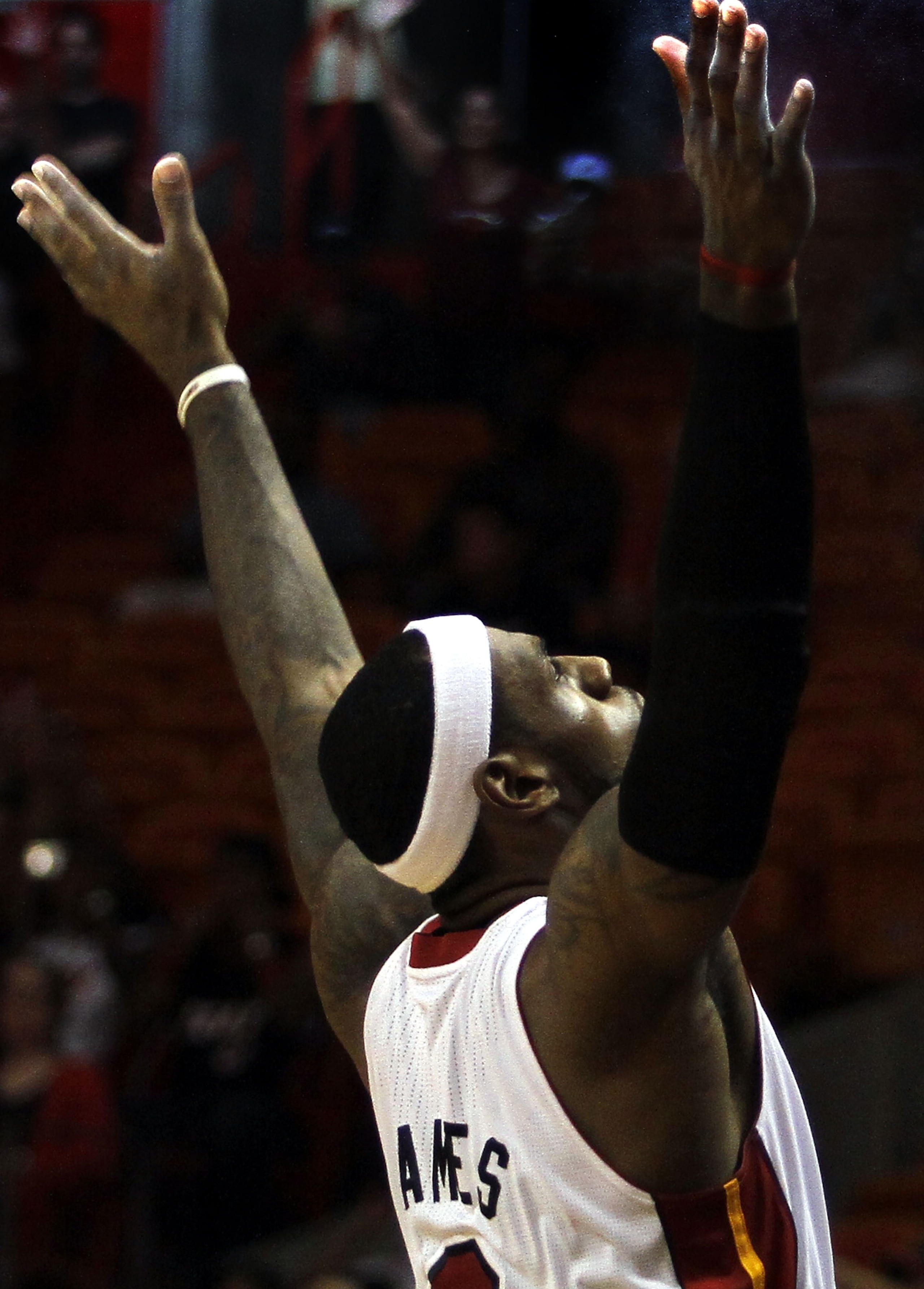 MIAMI - OCTOBER 18:  Forward LeBron James #6 of the Miami Heat prepares to face the Charlotte Bobcats on October 18, 2010 at American Airlines Arena in Miami, Florida. NOTE TO USER: User expressly acknowledges and agrees that, by downloading and/or using
