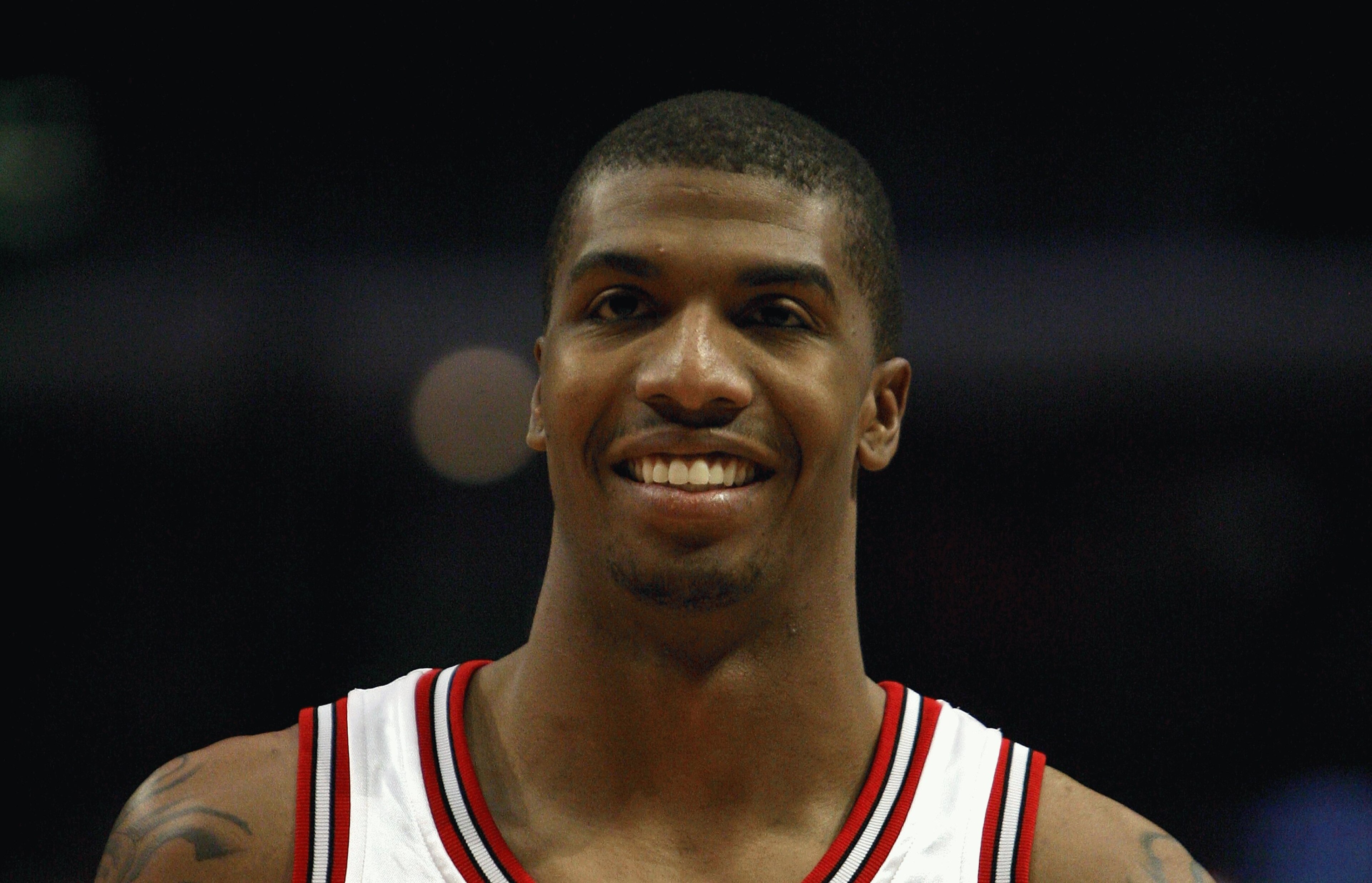 CHICAGO - FEBRUARY 24: Tyrus Thomas #24 of the Chicago Bulls smiles on court against the Orlando Magic at the United Center on Feberuary 24, 2009 in Chicago, Illinois. NOTE TO USER: User expressly acknowledges and agreees that, by downloading and/or usi CHICAGO - FEBRUARY 24: Tyrus Thomas #24 of the Chicago Bulls smiles on court against the Orlando Magic at the United Center on Feberuary 24, 2009 in Chicago, Illinois. NOTE TO USER: User expressly acknowledges and agreees that, by downloading and/or usi