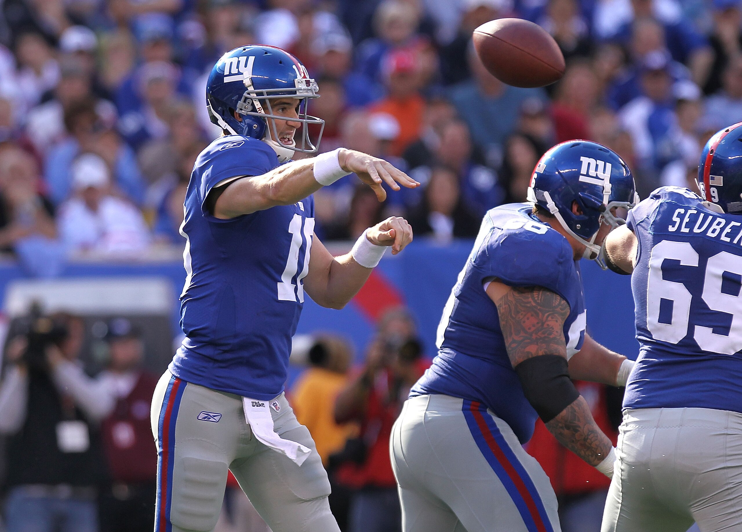 EAST RUTHERFORD, NJ - OCTOBER 17:  Eli Manning #10 of the New York Giants passes against the Detroit Lions at New Meadowlands Stadium on October 17, 2010 in East Rutherford, New Jersey.  (Photo by Nick Laham/Getty Images)