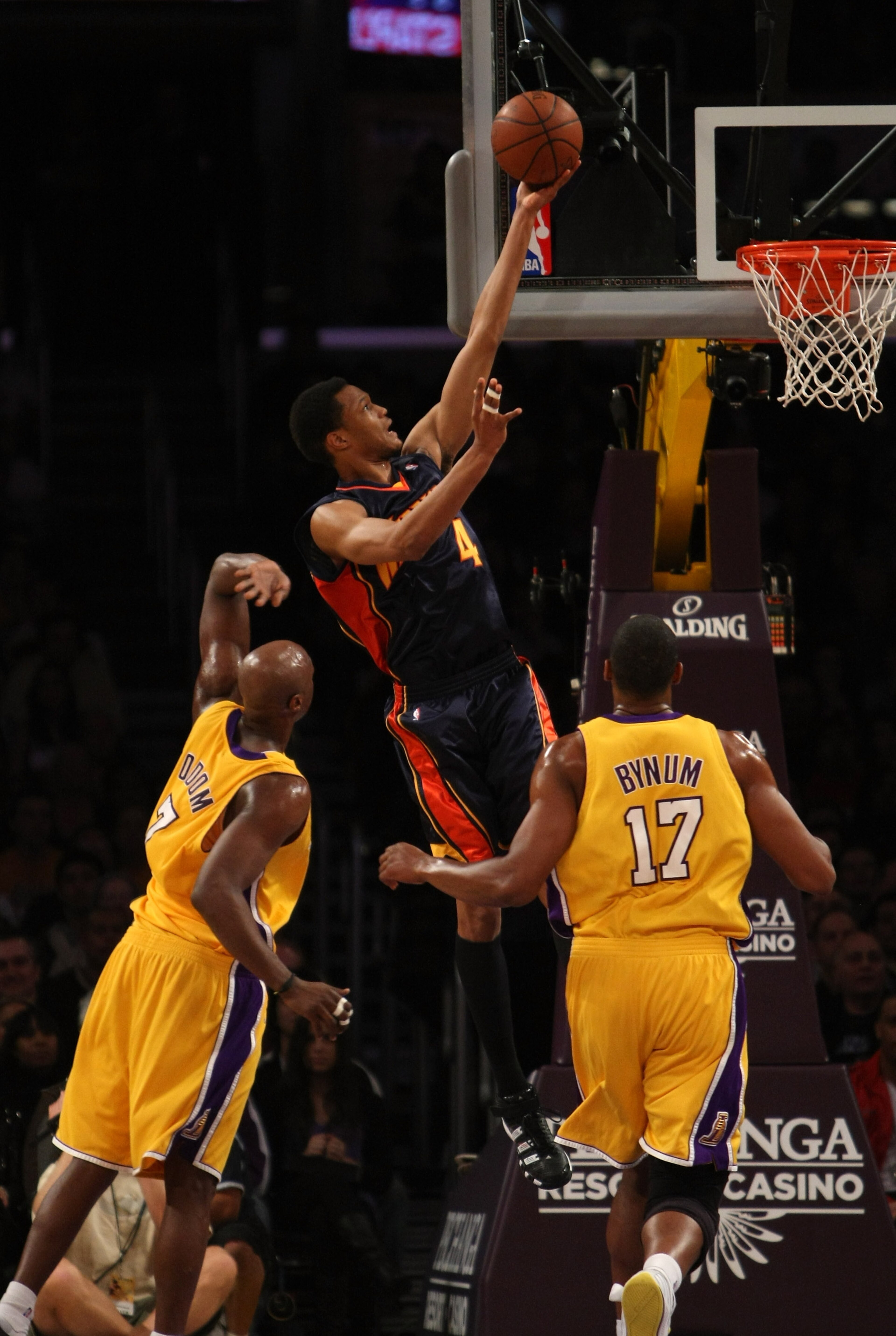 LOS ANGELES - NOVEMBER 15: Anthony Randolph #4 of the Golden State Warriors shoots over Lamar Odom #7 and Andrew Bynum #16 of the Los Angeles Lakers on December 29, 2009 at Staples Center in Los Angeles, California. NOTE TO USER: User expressly acknowle LOS ANGELES - NOVEMBER 15: Anthony Randolph #4 of the Golden State Warriors shoots over Lamar Odom #7 and Andrew Bynum #16 of the Los Angeles Lakers on December 29, 2009 at Staples Center in Los Angeles, California. NOTE TO USER: User expressly acknowle