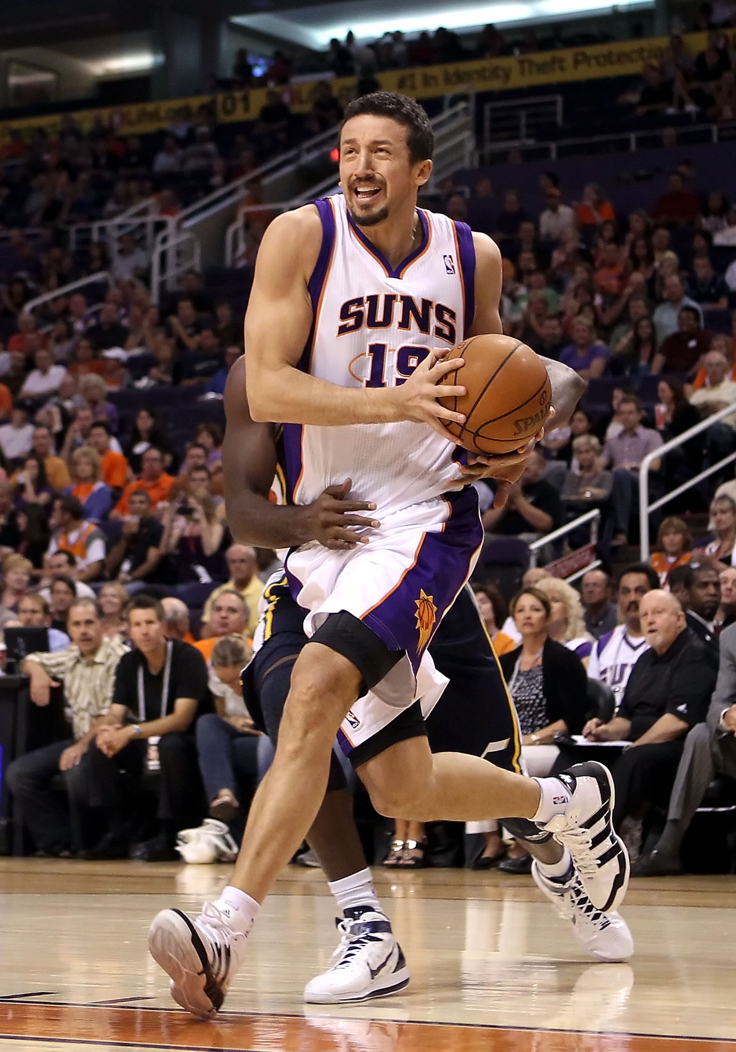 PHOENIX - OCTOBER 12:  Hedo Turkoglu #19 of the Phoenix Suns drives the ball during the preseason NBA game against the Utah Jazz at US Airways Center on October 12, 2010 in Phoenix, Arizona. NOTE TO USER: User expressly acknowledges and agrees that, by do