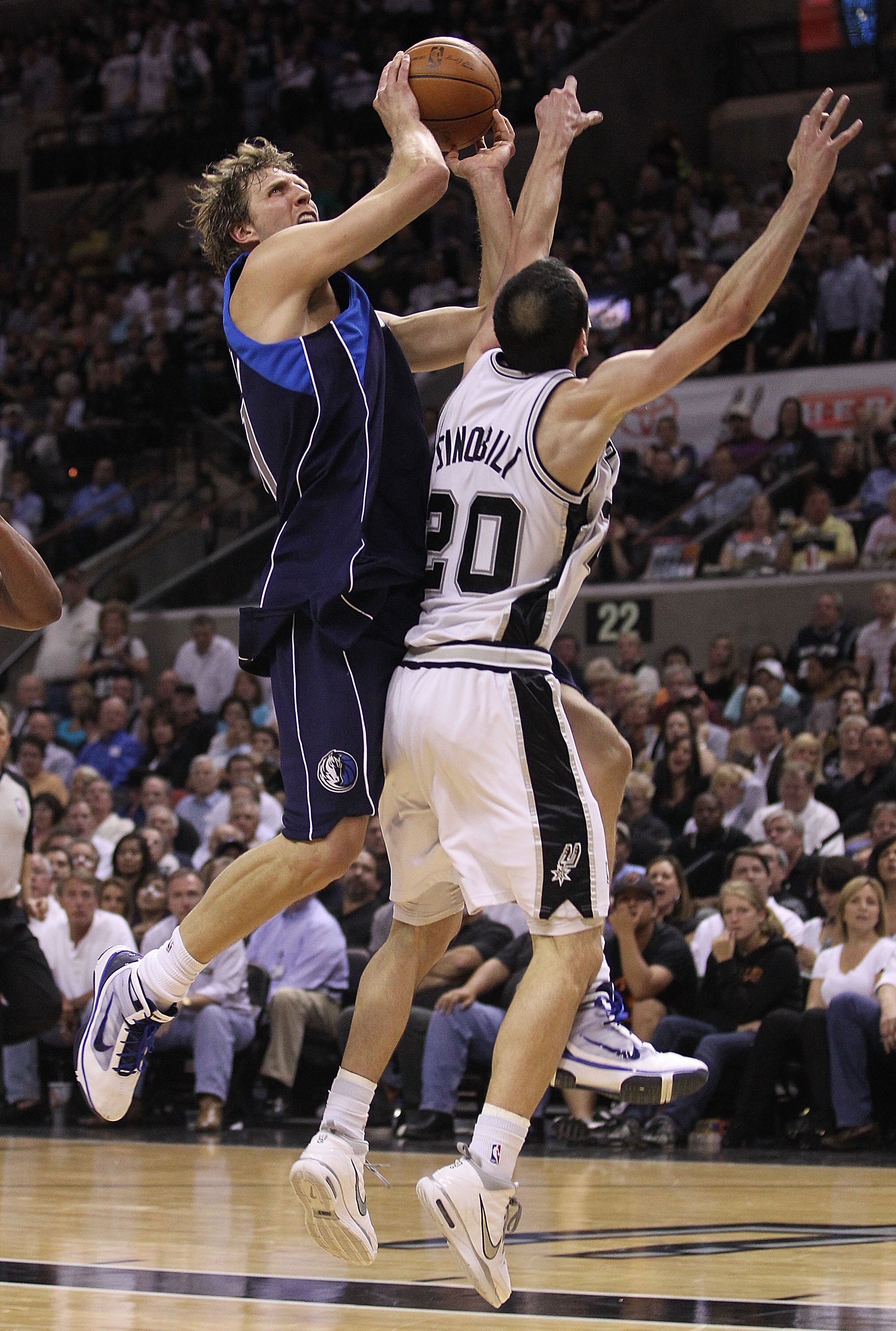 SAN ANTONIO - APRIL 29:  Forward Dirk Nowitzki #41 of the Dallas Mavericks takes a shot against Manu Ginobili #20 of the San Antonio Spurs in Game Six of the Western Conference Quarterfinals during the 2010 NBA Playoffs at AT&T Center on April 29, 2010 in