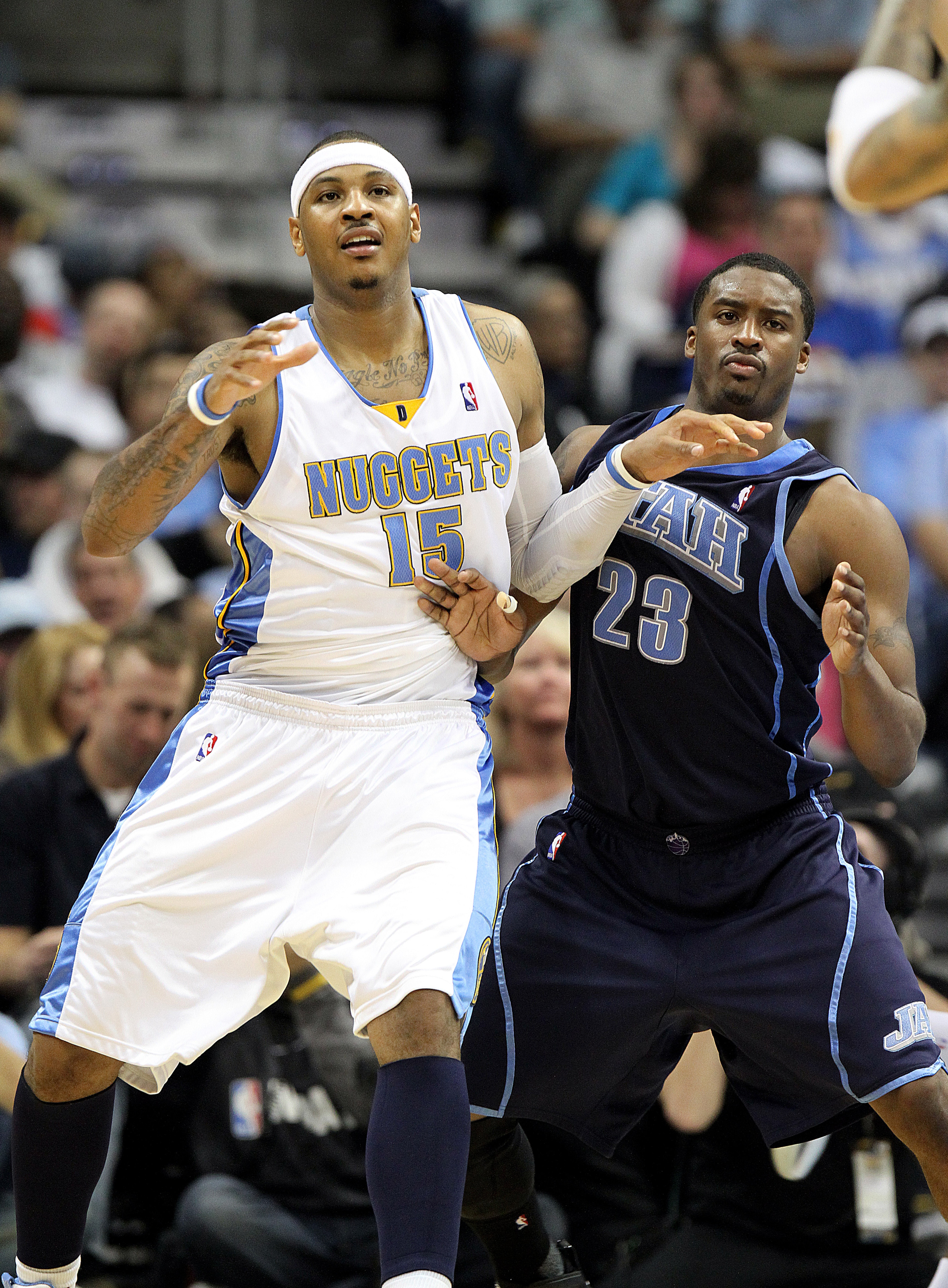 DENVER, CO - APRIL 17: Carmelo Anthony #15 of the Denver Nuggets posts up against Wesley Matthews #23 of the Utah Jazz during the second half of Game One of the Western Conference Quarterfinals of the 2010 NBA Playoffs at the Pepsi Center on April 17, 201 DENVER, CO - APRIL 17: Carmelo Anthony #15 of the Denver Nuggets posts up against Wesley Matthews #23 of the Utah Jazz during the second half of Game One of the Western Conference Quarterfinals of the 2010 NBA Playoffs at the Pepsi Center on April 17, 201