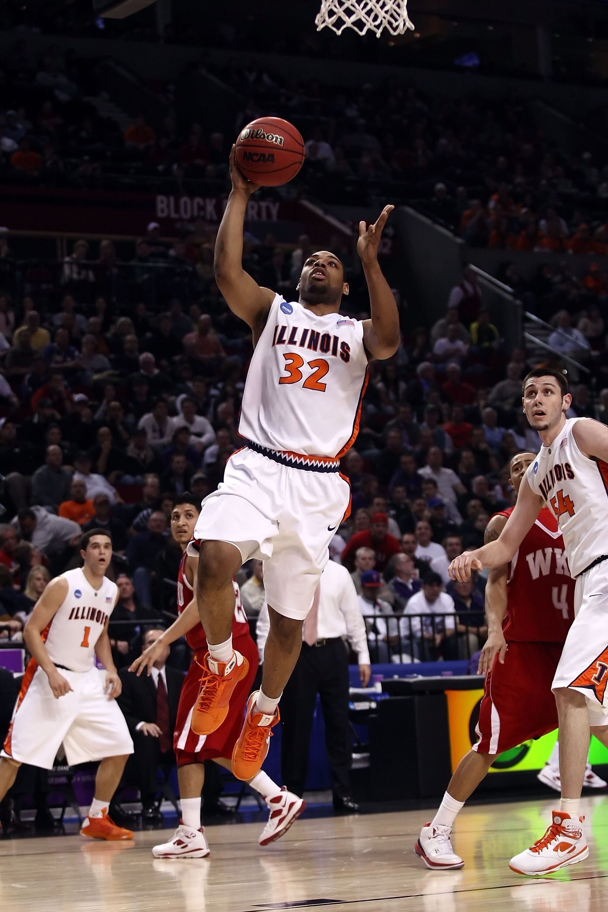 PORTLAND, OR - MARCH 19:  Demetri McCamey #32 of the Illinois Fighting Illini goes up for a layup in the first half against the Western Kentucky Hilltoppers during the first round of the NCAA Division I Men's Basketball Tournament at the Rose Garden on Ma