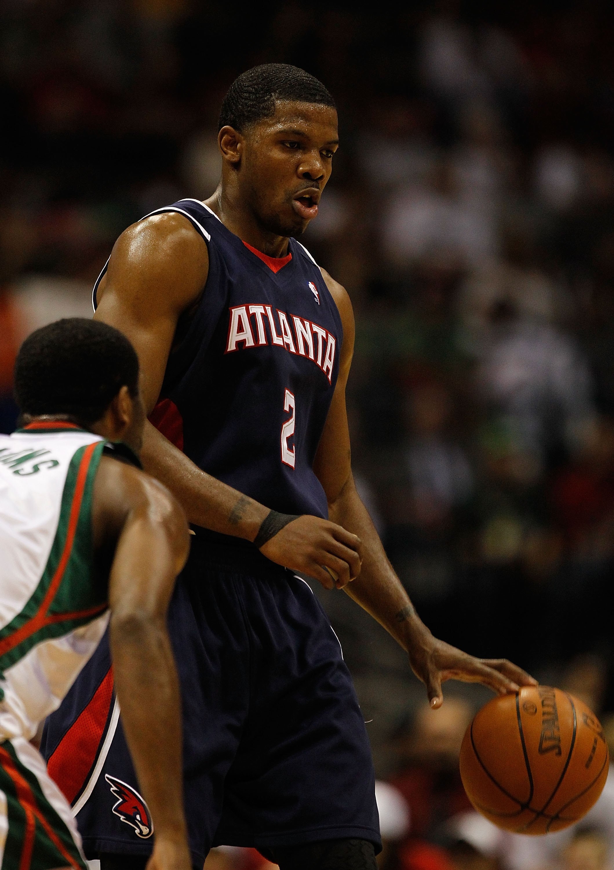 MILWAUKEE - APRIL 30: Joe Johnson #2 of the Atlanta Hawks dribbles with ball agaiunst the Milwaukee Bucks in Game Six of the Eastern Conference Quarterfinals during the 2010 NBA Playoffs at the Bradley Center on April 30, 2010 in Milwaukee, Wisconsin. The MILWAUKEE - APRIL 30: Joe Johnson #2 of the Atlanta Hawks dribbles with ball agaiunst the Milwaukee Bucks in Game Six of the Eastern Conference Quarterfinals during the 2010 NBA Playoffs at the Bradley Center on April 30, 2010 in Milwaukee, Wisconsin. The