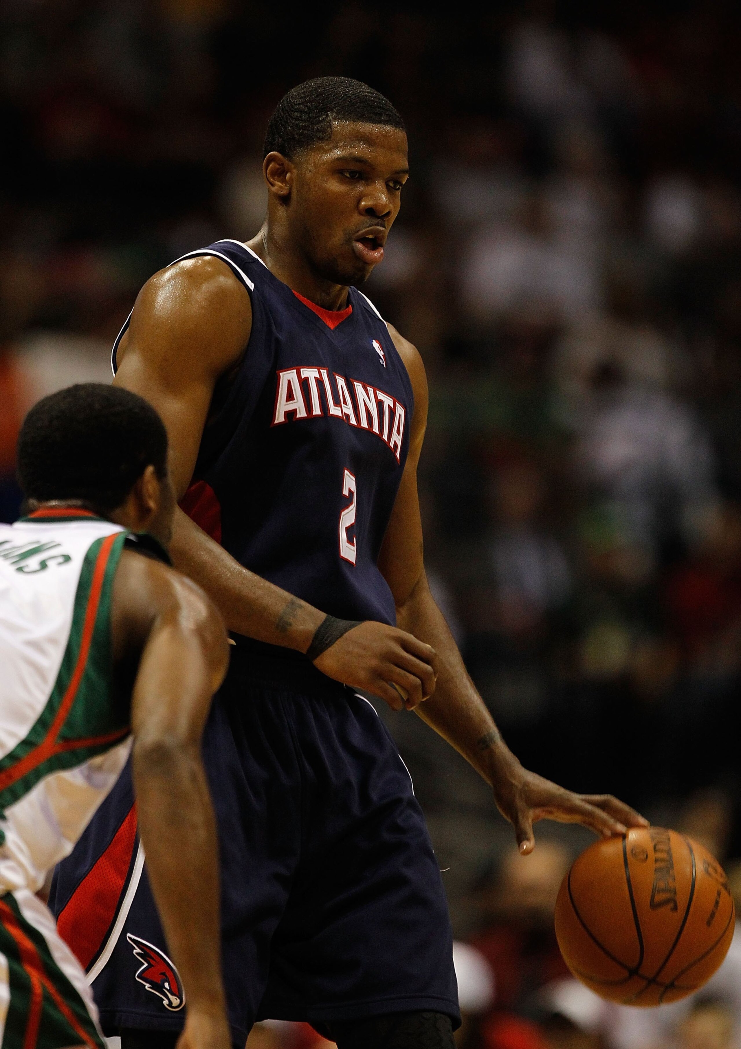 MILWAUKEE - APRIL 30: Joe Johnson #2 of the Atlanta Hawks dribbles with ball agaiunst the Milwaukee Bucks in Game Six of the Eastern Conference Quarterfinals during the 2010 NBA Playoffs at the Bradley Center on April 30, 2010 in Milwaukee, Wisconsin. The