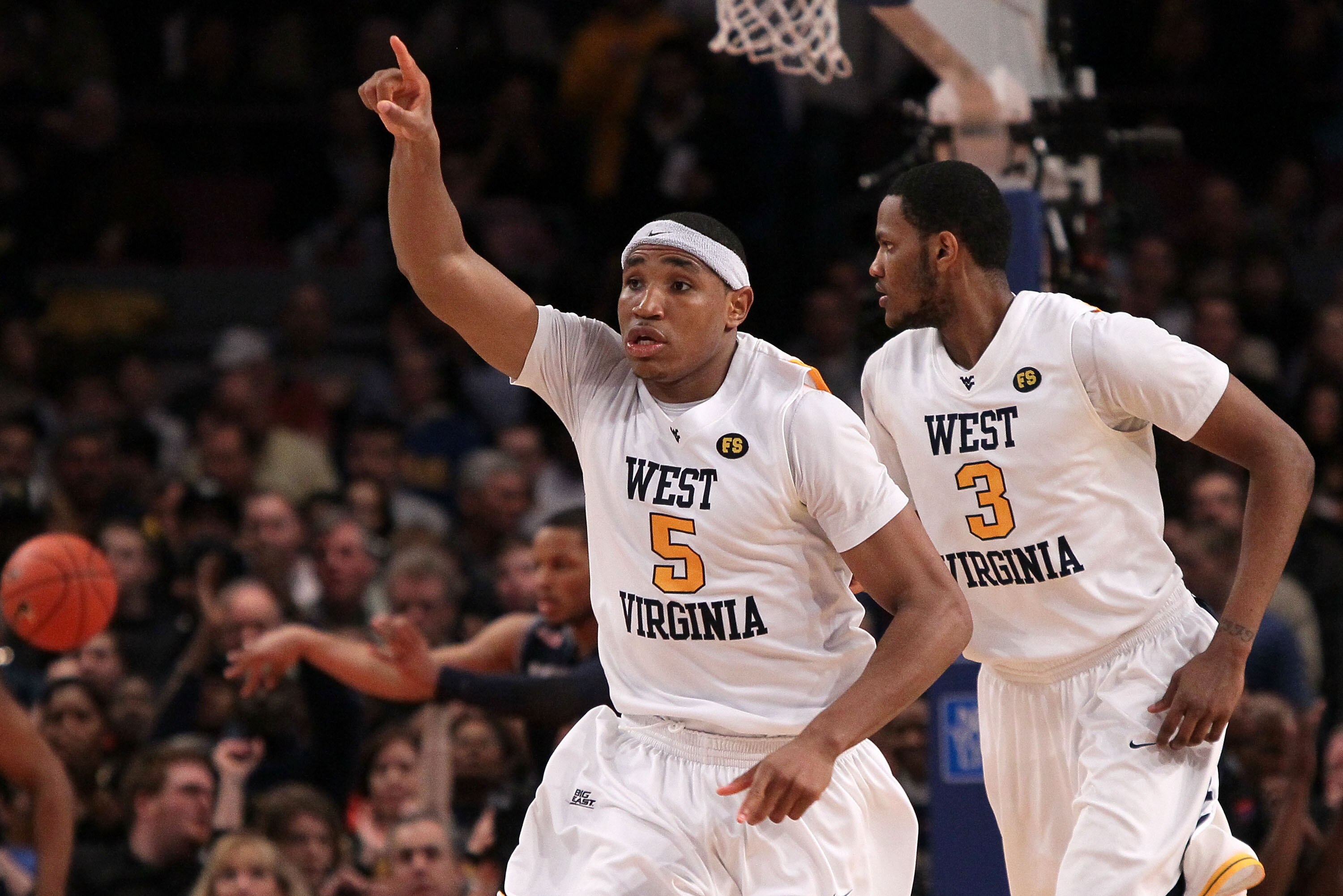 NEW YORK - MARCH 13: Kevin Jones #5 of the West Virginia Mountaineers reacts after a play against the Georgetown Hoyas during the championship of the 2010 NCAA Big East Tournament at Madison Square Garden on March 13, 2010 in New York City.  (Photo by Jim