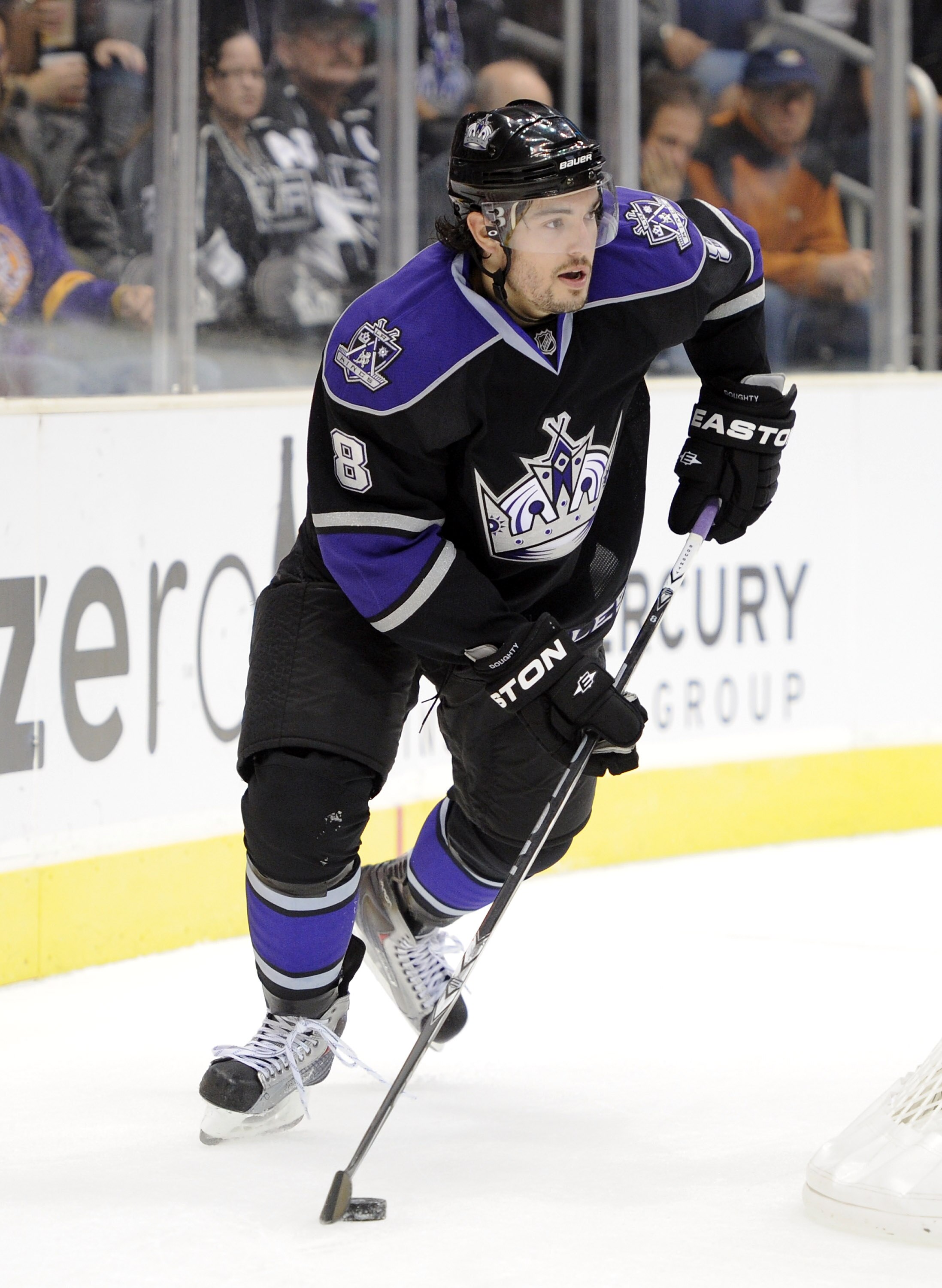 LOS ANGELES, CA - OCTOBER 15:  Drew Doughty #8 of the Los Angeles Kings starts a rush during the game against the Vancouver Canucks at the Staples Center on October 15, 2010 in Los Angeles, California.  (Photo by Harry How/Getty Images)