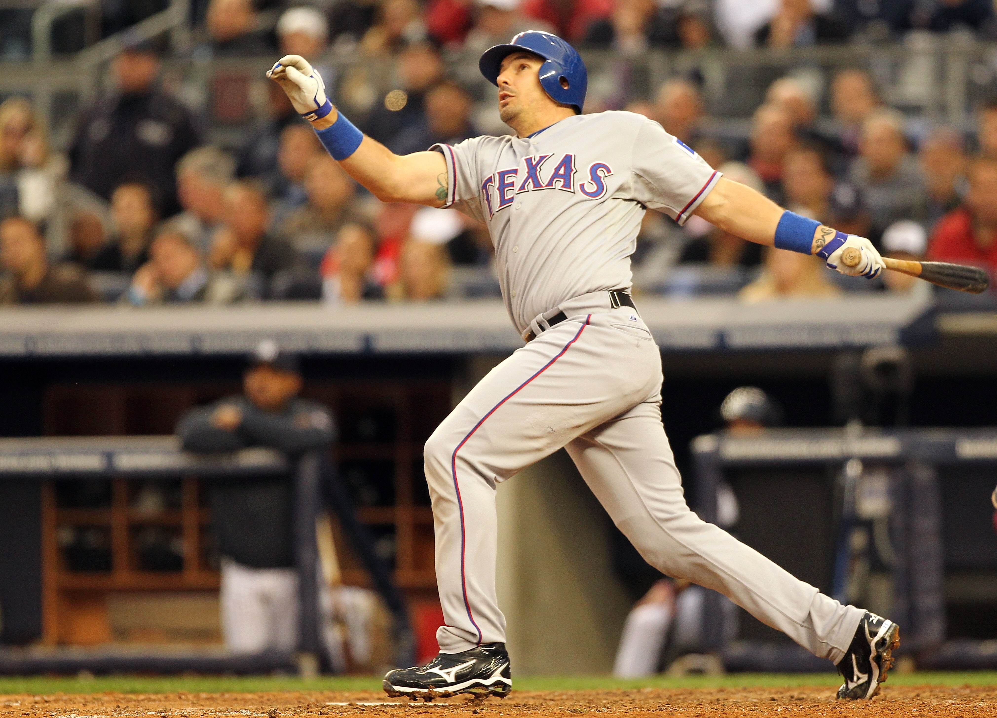 NEW YORK - OCTOBER 20: Matt Treanor #15 of the Texas Rangers hits a solo homerun against the New York Yankees in Game Five of the ALCS during the 2010 MLB Playoffs at Yankee Stadium on October 20, 2010 in the Bronx borough of New York City.  (Photo by Al
