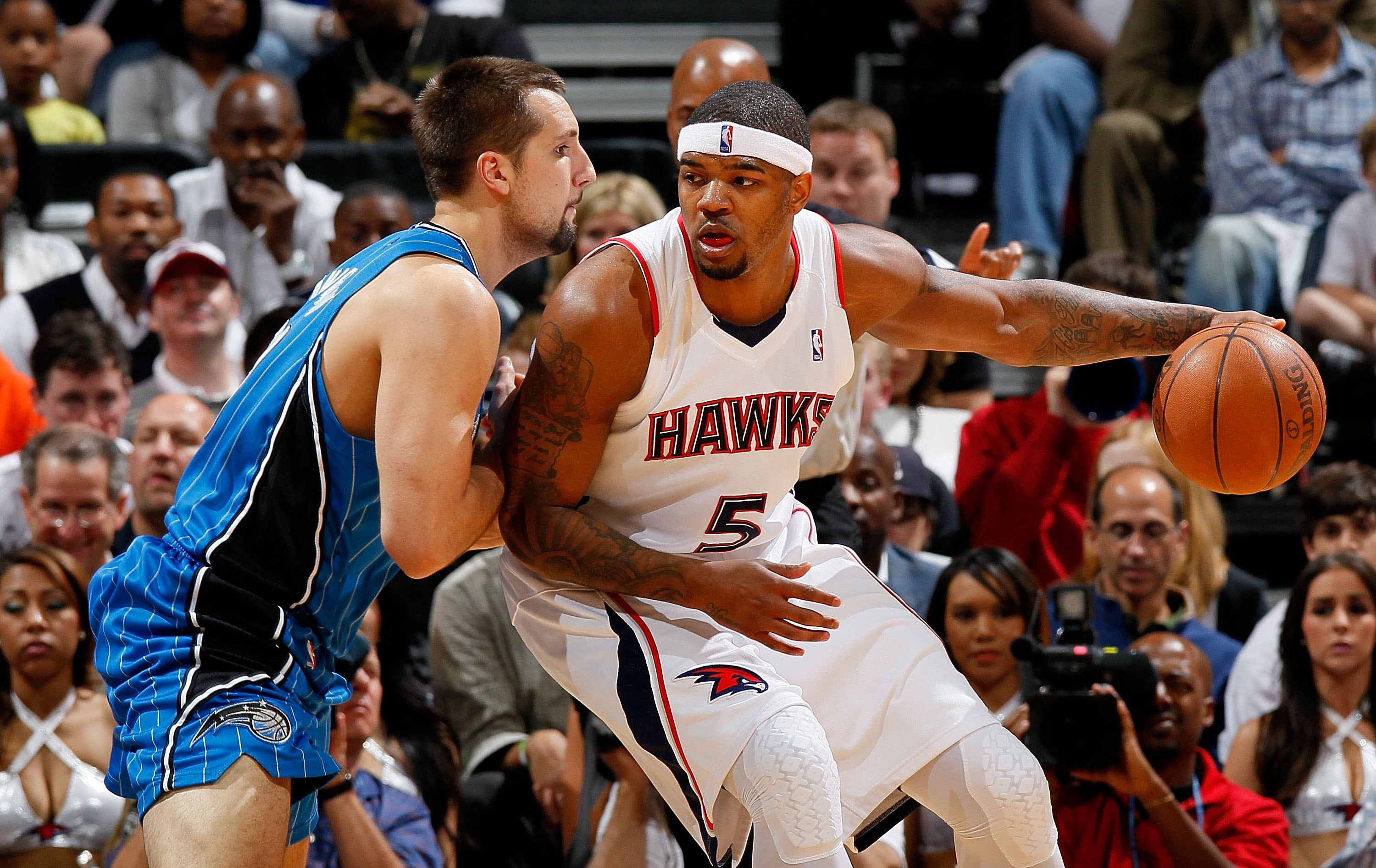 ATLANTA - MAY 10:  Ryan Anderson #33 of the Orlando Magic against Josh Smith #5 of the Atlanta Hawks during Game Four of the Eastern Conference Semifinals of the 2010 NBA Playoffs at Philips Arena on May 10, 2010 in Atlanta, Georgia.  NOTE TO USER: User e