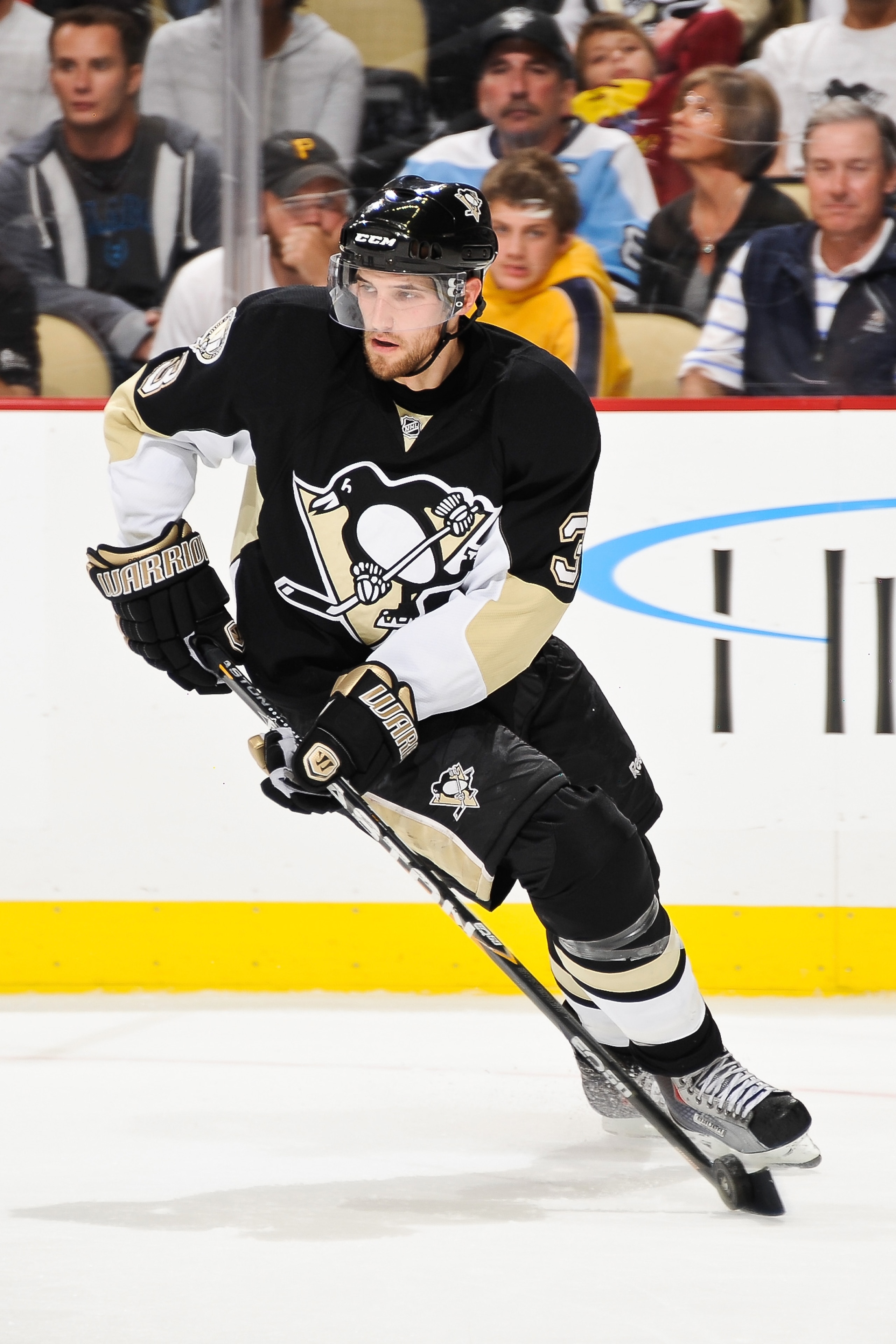 PITTSBURGH - OCTOBER 13:  Alex Goligoski #3 of the Pittsburgh Penguins skates with the puck against the Toronto Maple Leafs on October 13, 2010 at Consol Energy Center in Pittsburgh, Pennsylvania.  (Photo by Jamie Sabau/Getty Images)