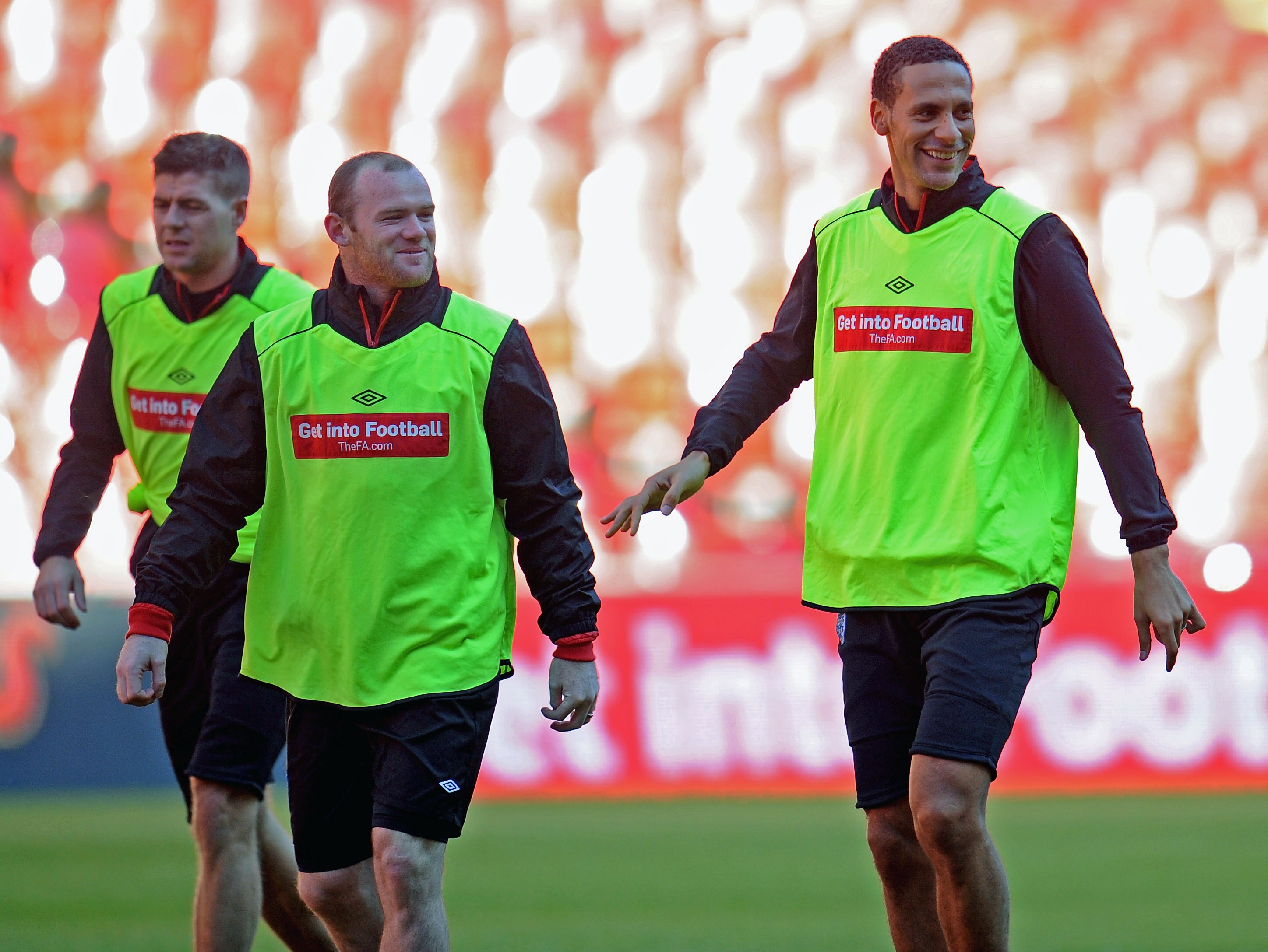 LONDON, ENGLAND - OCTOBER 11: Rio Ferdinand, Wayne Rooney and Steven Gerrard look on during the England training session at Wembley Stadium on October 11, 2010 in London, England.  (Photo by Michael Regan/Getty Images)