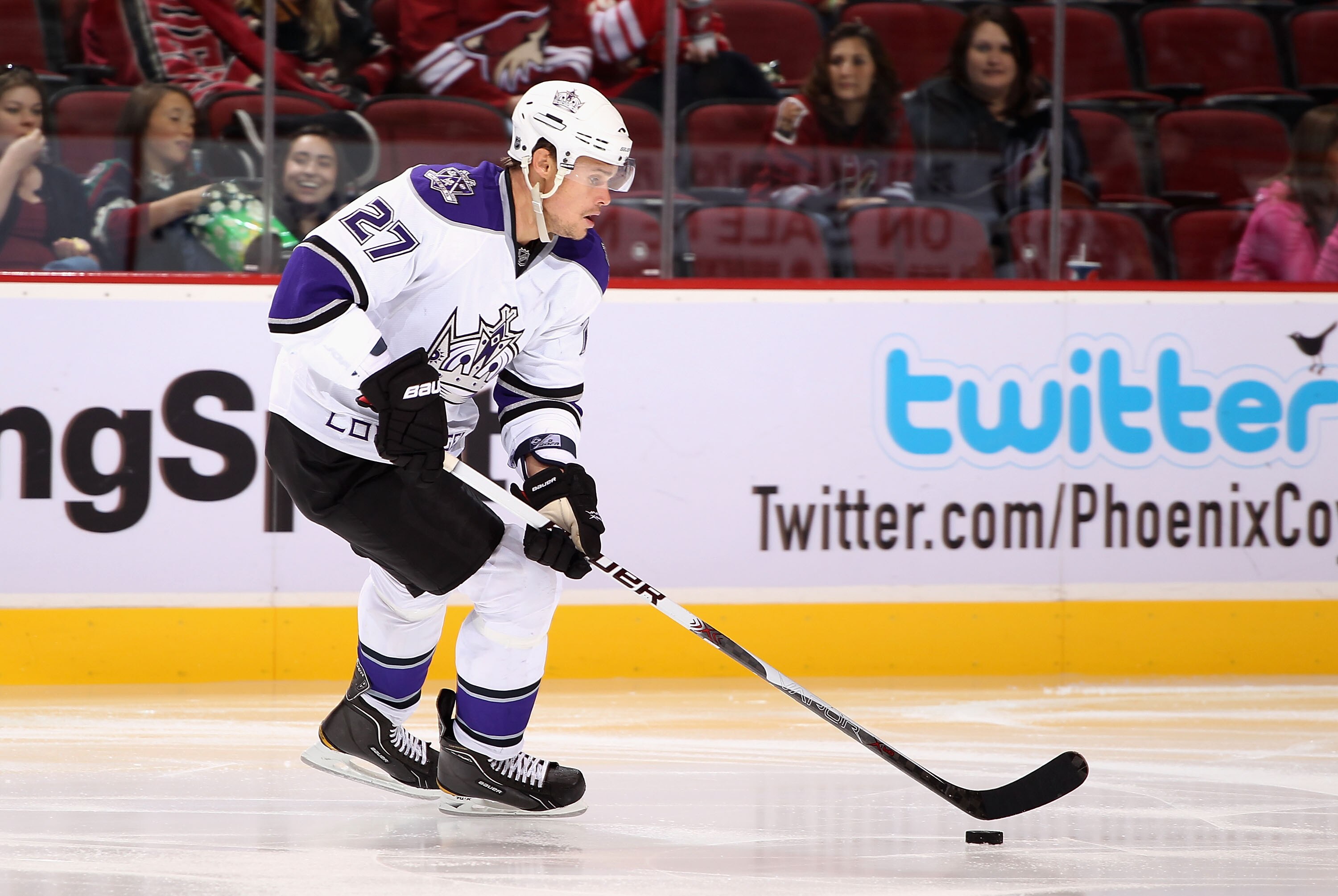 GLENDALE, AZ - SEPTEMBER 23:  Alexei Ponikarovsky #27 of the Los Angeles Kings skates with the puck during the preseason NHL game against the Phoenix Coyotes at Jobing.com Arena on September 23, 2010 in Glendale, Arizona. The Coyotes defeated the Kings 2-