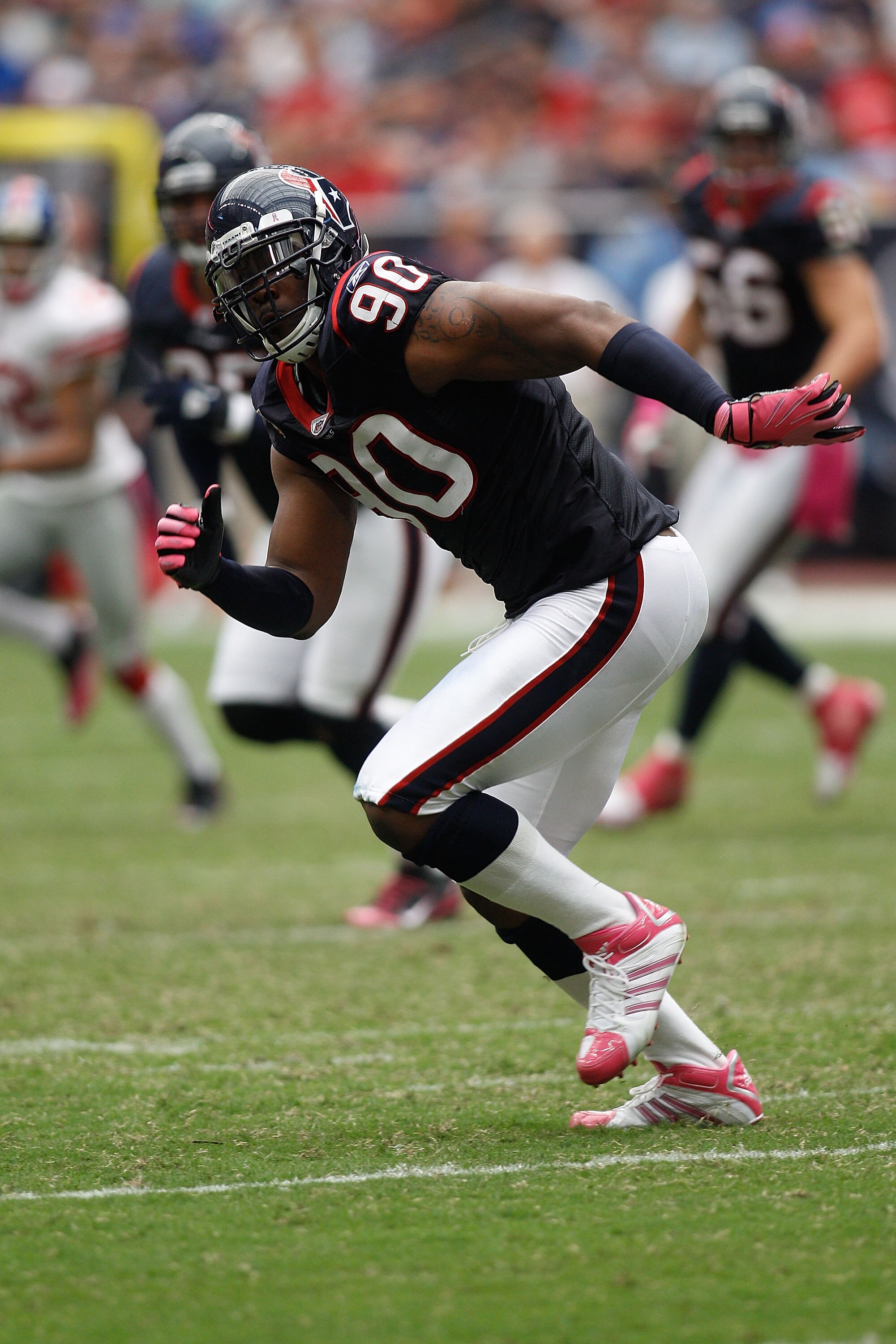 HOUSTON - OCTOBER 10:  Mario Williams #90 of the Houston Texans in action during the game against the New York Giants at Reliant Stadium on October 10, 2010 in Houston, Texas.  (Photo by Chris Graythen/Getty Images)