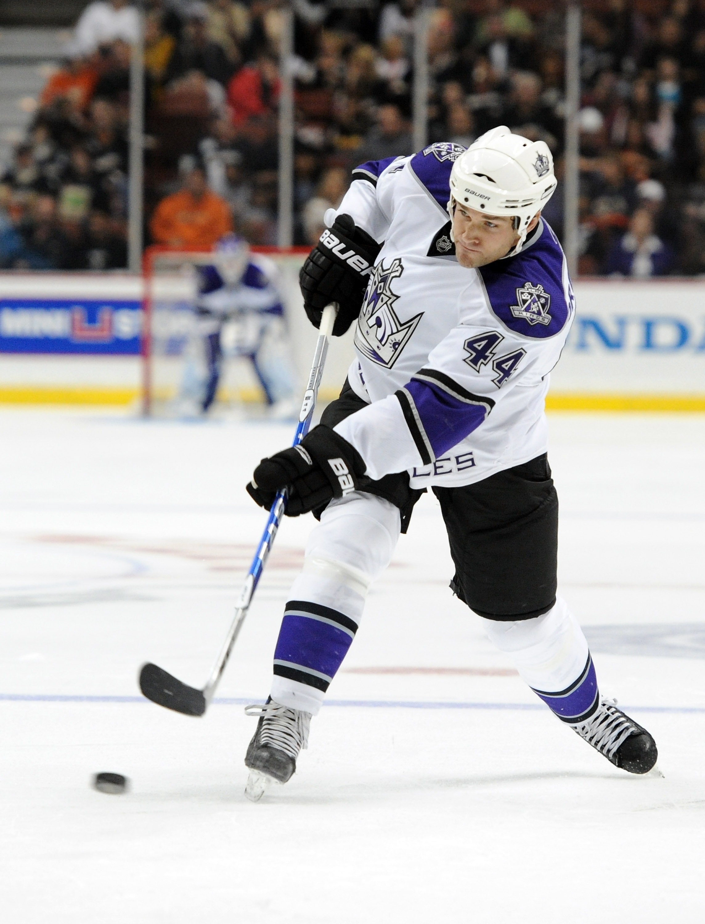 ANAHEIM, CA - OCTOBER 03:  Davis Drewiske #44 of the Los Angeles Kings shoots the puck at the point against the Anaheim Ducks at Honda Center on October 3, 2010 in Anaheim, California.  (Photo by Harry How/Getty Images)