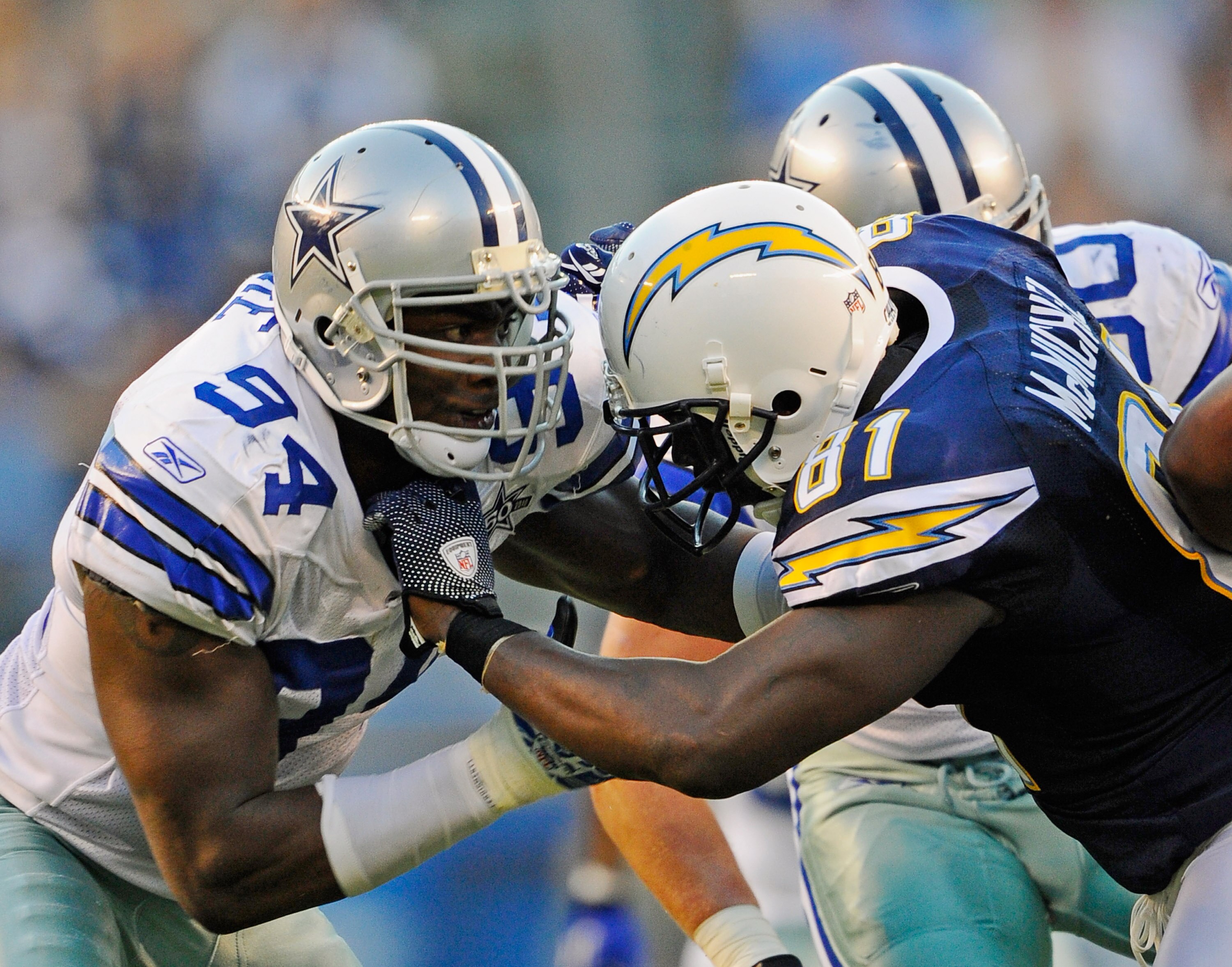 SAN DIEGO - AUGUST 21:  Line backer DeMarcus Ware #94 of the Dallas Cowboys in action against tight end Randy McMichael #81 of the San Diego Chargers at Qualcomm Stadium on August 21, 2010 in San Diego, California.  (Photo by Kevork Djansezian/Getty Image