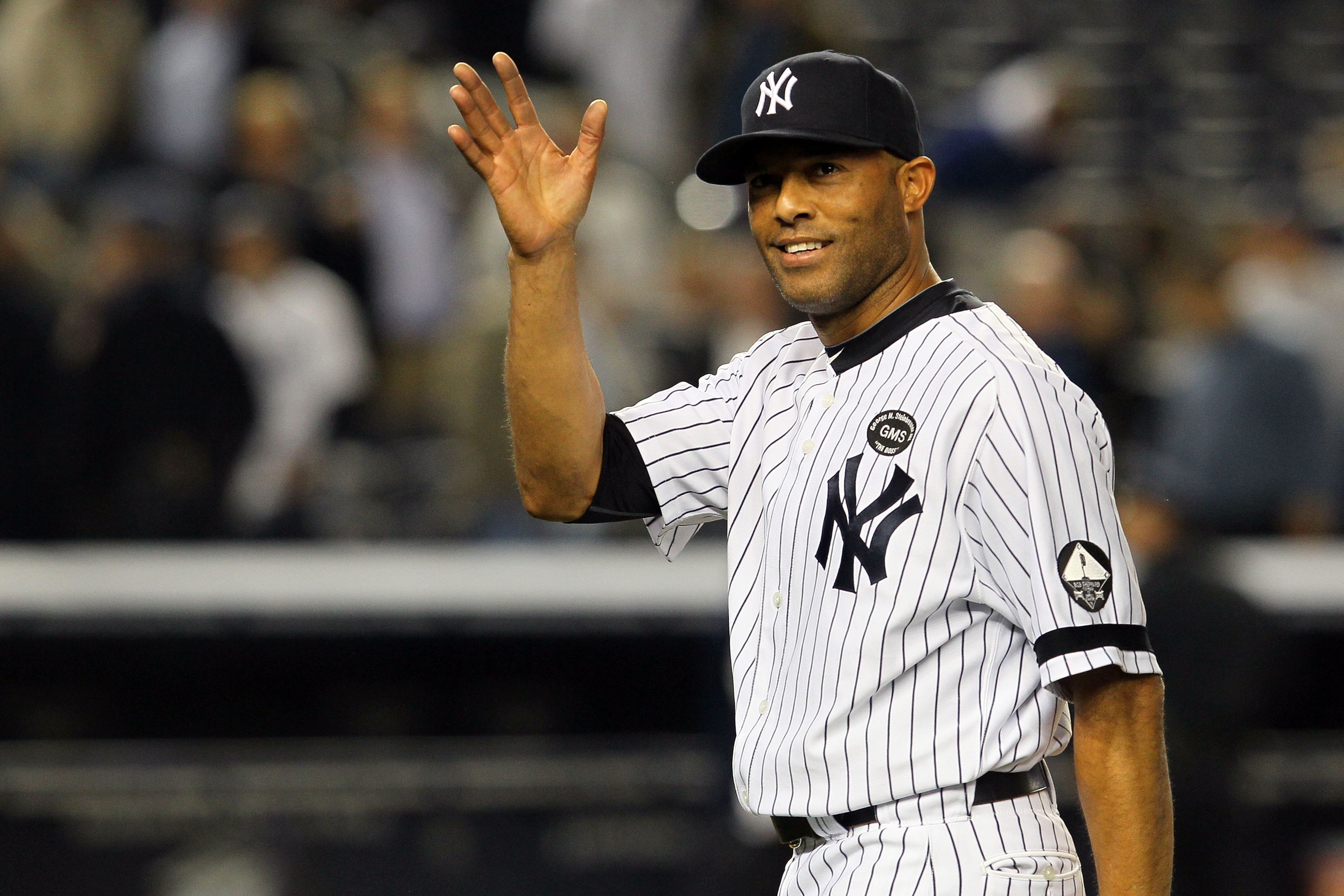 NEW YORK - OCTOBER 20: Mariano Rivera #42 of the New York Yankees celebrates after the Yankees won 7-2 against the Texas Rangers in Game Five of the ALCS during the 2010 MLB Playoffs at Yankee Stadium on October 20, 2010 in the Bronx borough of New York C