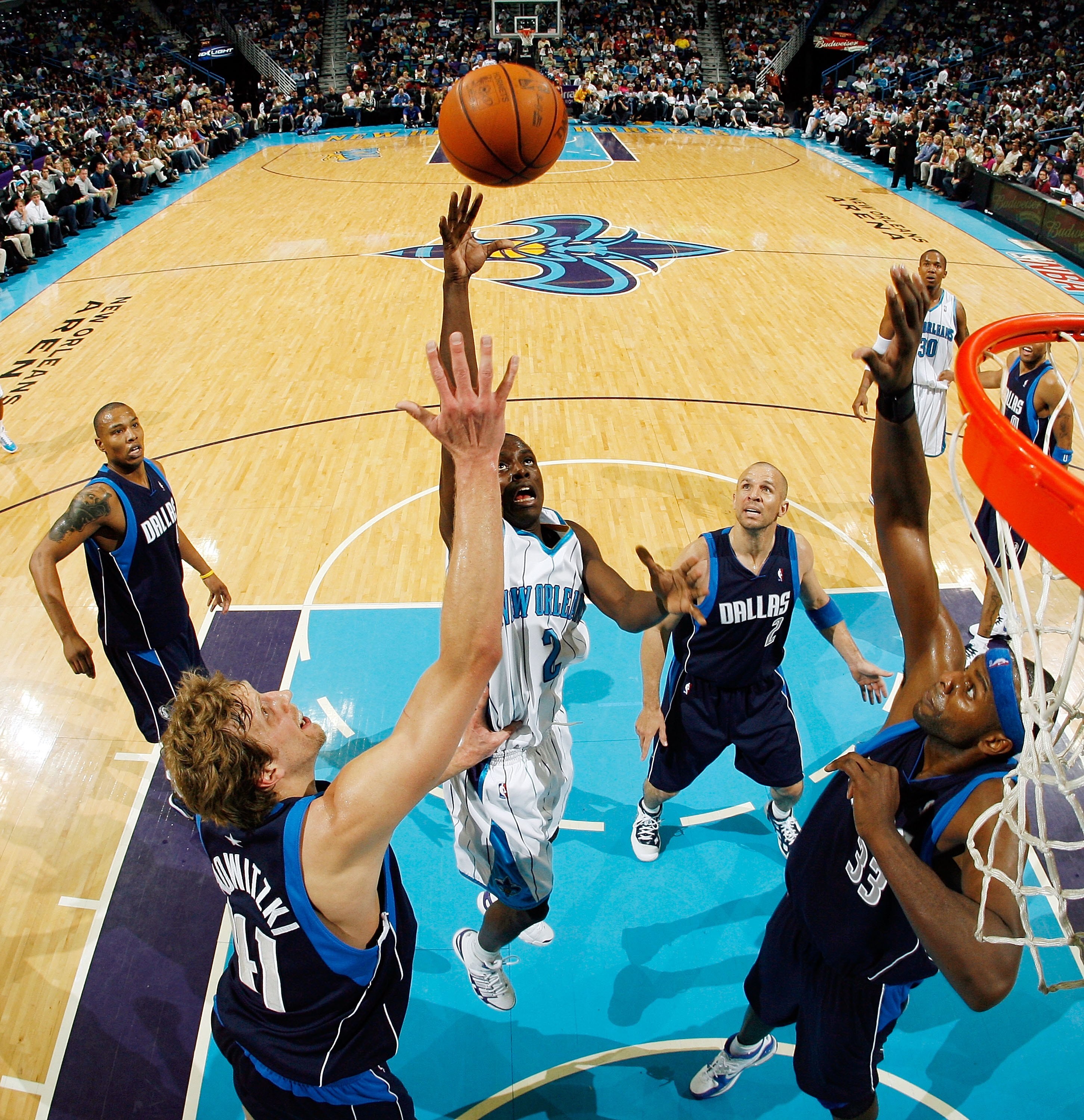 NEW ORLEANS - MARCH 22:  Darren Collison #2 of the New Orleans Hornets shoots the ball over Dirk Nowitzki #41 of the Dallas Mavericks at the New Orleans Arena on March 22, 2010 in New Orleans, Louisiana.  NOTE TO USER: User expressly acknowledges and agre