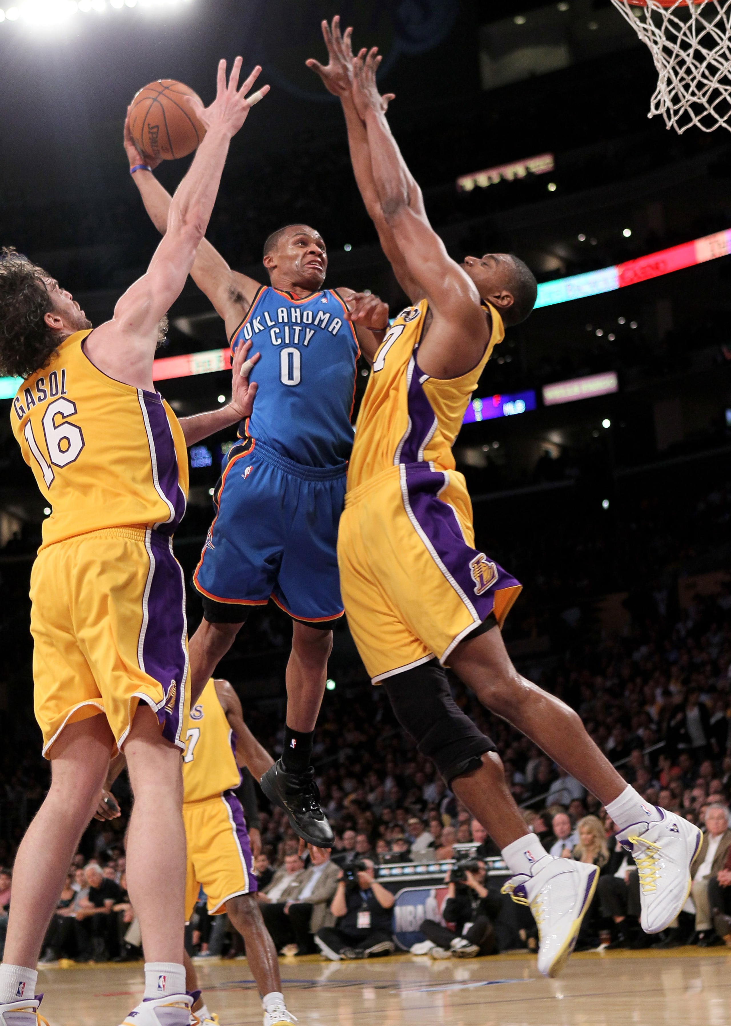 LOS ANGELES - APRIL 20:  Russell Westbrook #0 of the Oklahoma City Thunde goes up for a shot over Gasol #16 of the Los Angeles Lakers during  Game Two of the Western Conference Quarterfinals of the 2010 NBA Playoffs on April 20, 2010 at Staples Center in