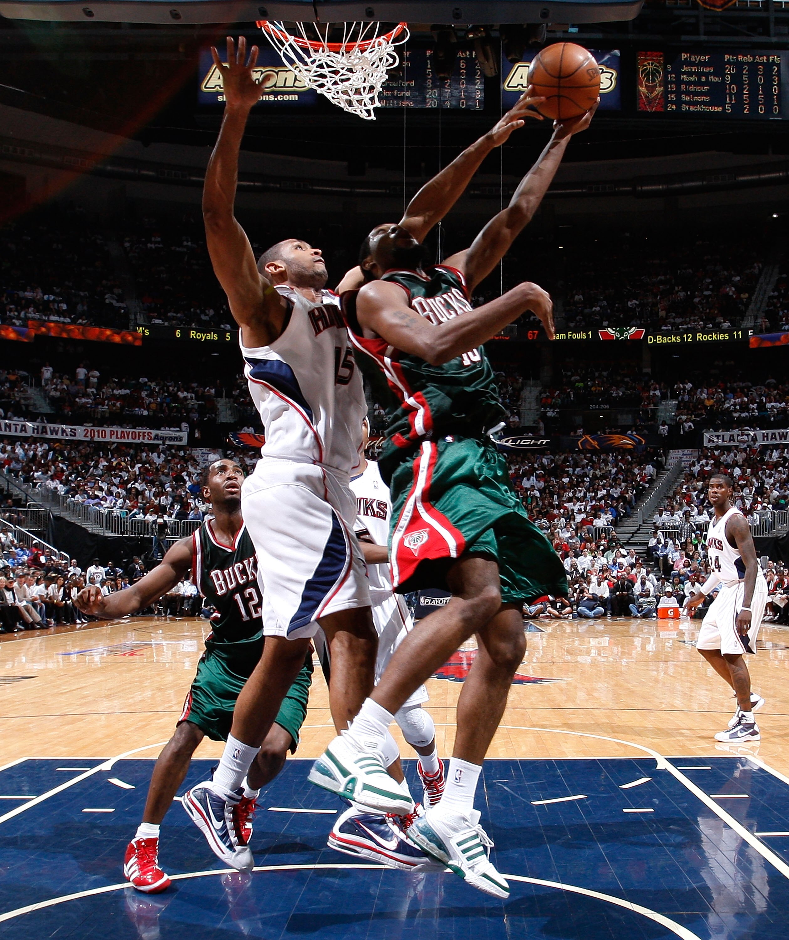 ATLANTA - APRIL 28:  Al Horford #15 of the Atlanta Hawks defends against John Salmons #15 of the Milwaukee Bucks during Game Five of the Eastern Conference Quarterfinals of the 2010 NBA Playoffs at Philips Arena on April 28, 2010 in Atlanta, Georgia.  NOT