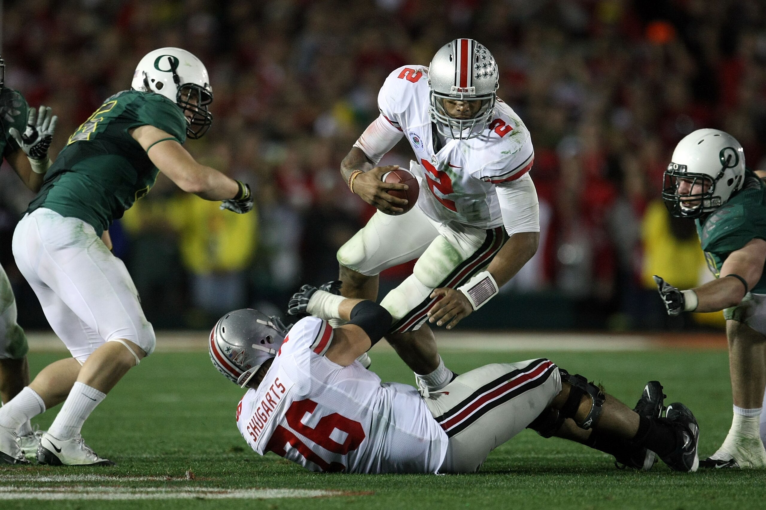 PASADENA, CA - JANUARY 01: Quarterback Terrelle Pryor #2 of the Ohio State Buckeyes dives with the ball against the Oregon Ducks during the 96th Rose Bowl game on January 1, 2010 in Pasadena, California. (Photo by Stephen Dunn/Getty Images) PASADENA, CA - JANUARY 01: Quarterback Terrelle Pryor #2 of the Ohio State Buckeyes dives with the ball against the Oregon Ducks during the 96th Rose Bowl game on January 1, 2010 in Pasadena, California. (Photo by Stephen Dunn/Getty Images)