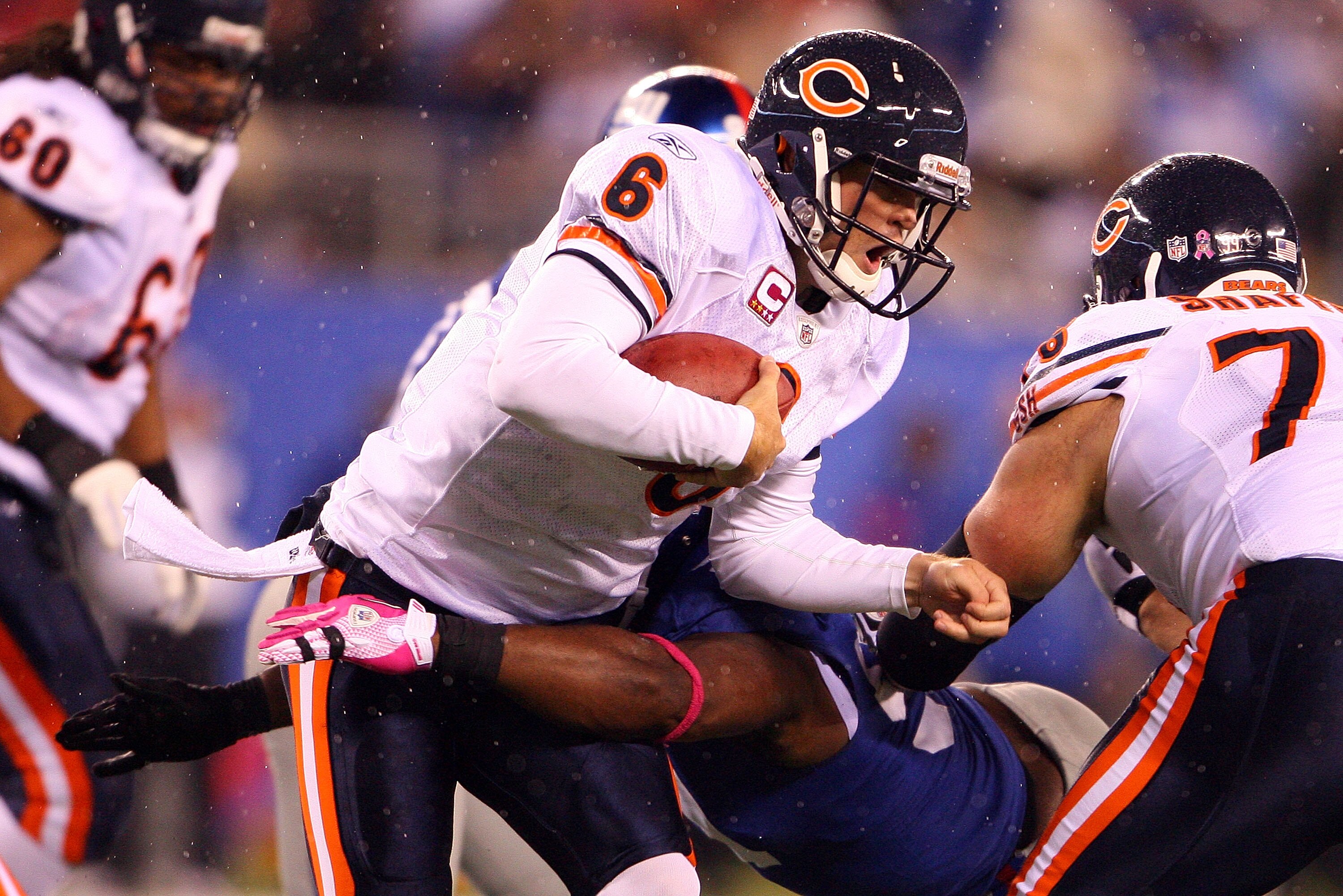 EAST RUTHERFORD, NJ - OCTOBER 03:  Jay Cutler #6 of the Chicago Bears gets sacked by Justin Tuck #91 of the New York Giants at New Meadowlands Stadium on October 3, 2010 in East Rutherford, New Jersey.  (Photo by Andrew Burton/Getty Images)