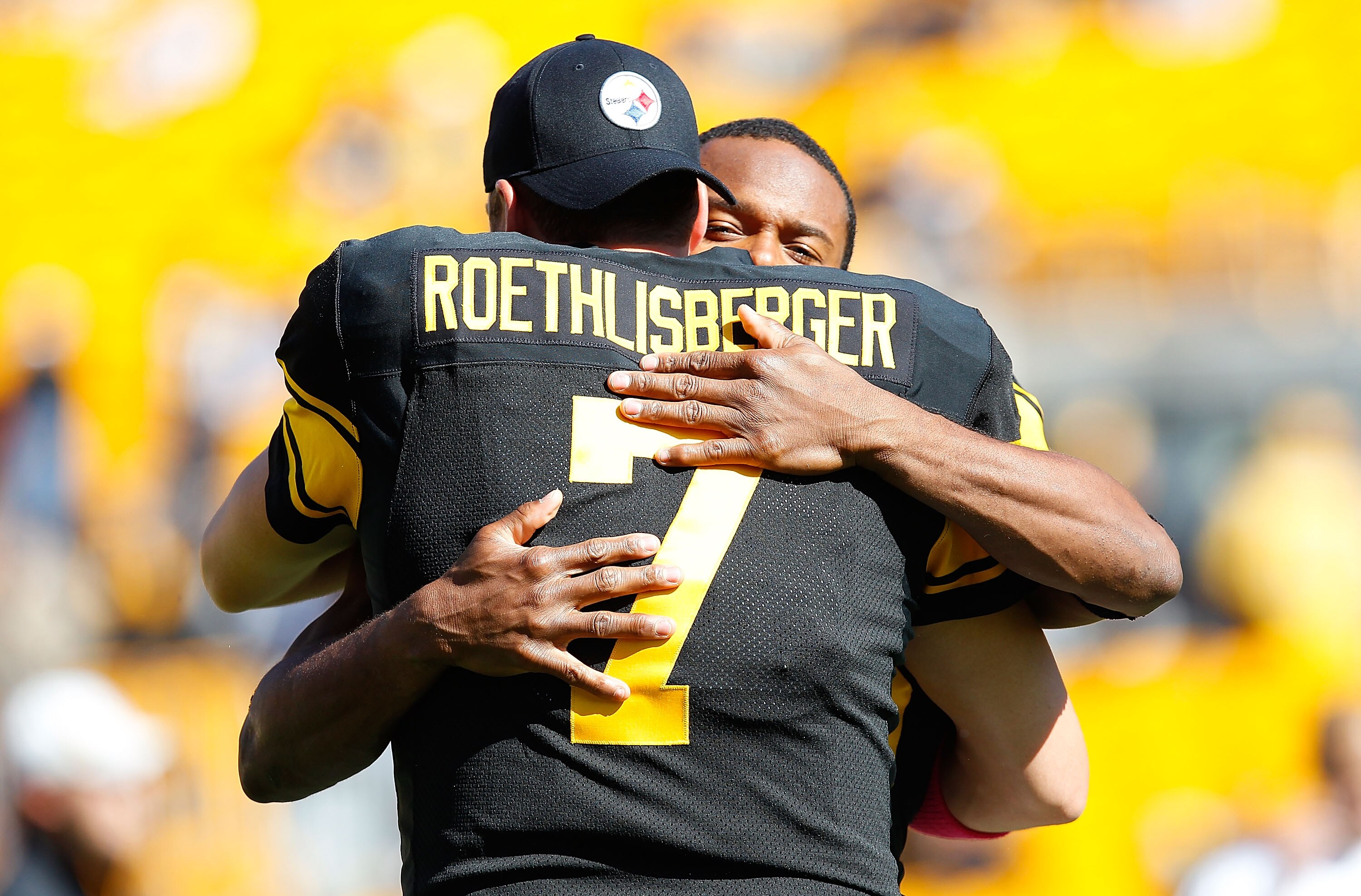 PITTSBURGH - OCTOBER 17:  Ben Roethlisberger #7 of the Pittsburgh Steelers greets teammate Will Allen #26 before the game against the Cleveland Browns on October 17, 2010 at Heinz Field in Pittsburgh, Pennsylvania.  (Photo by Jared Wickerham/Getty Images)