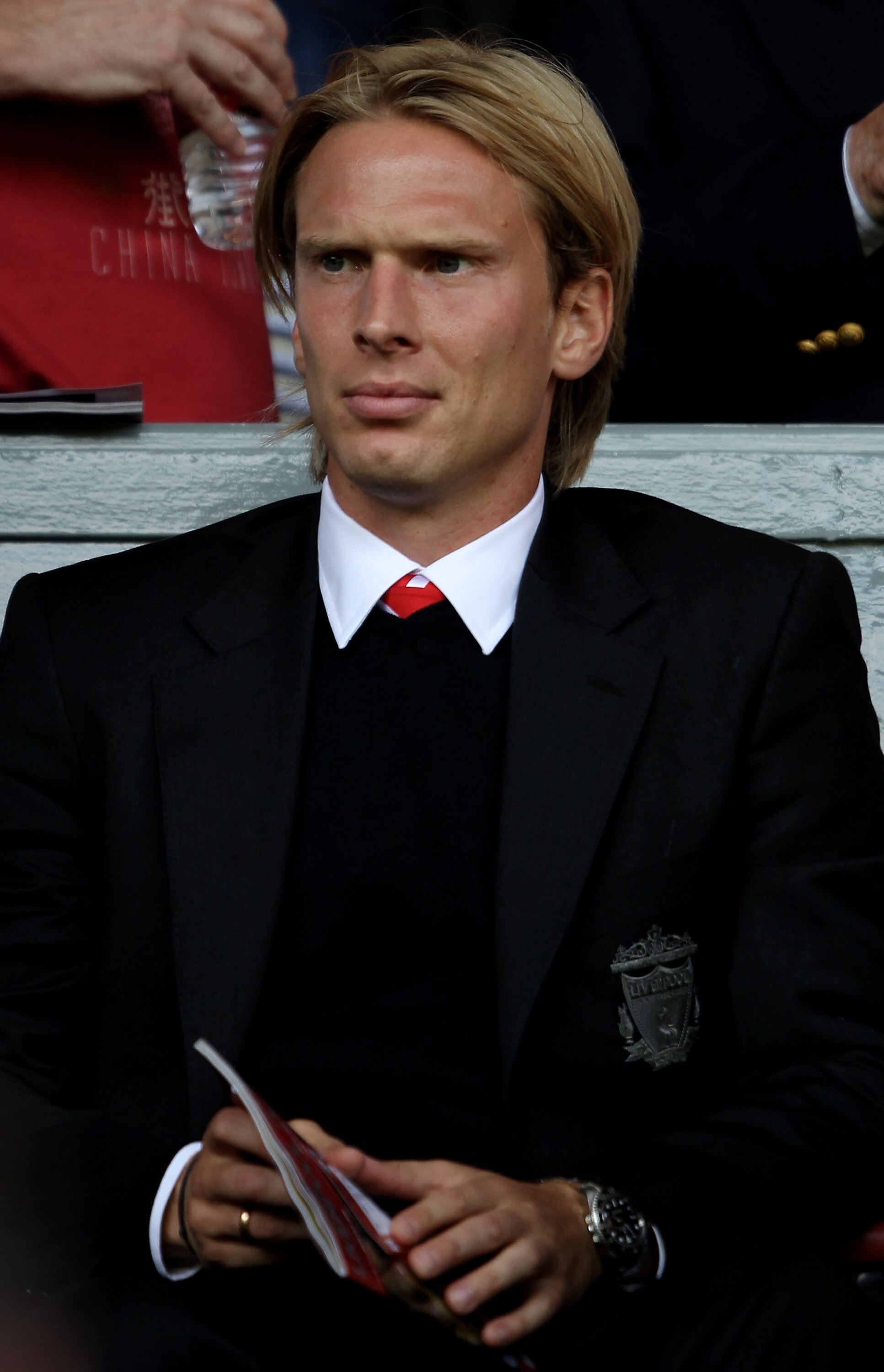 LIVERPOOL, ENGLAND - AUGUST 15:  Christian Poulsen of Liverpool looks on during the Barclays Premier League match between Liverpool and Arsenal at Anfield on August 15, 2010 in Liverpool, England. (Photo by Clive Brunskill/Getty Images)