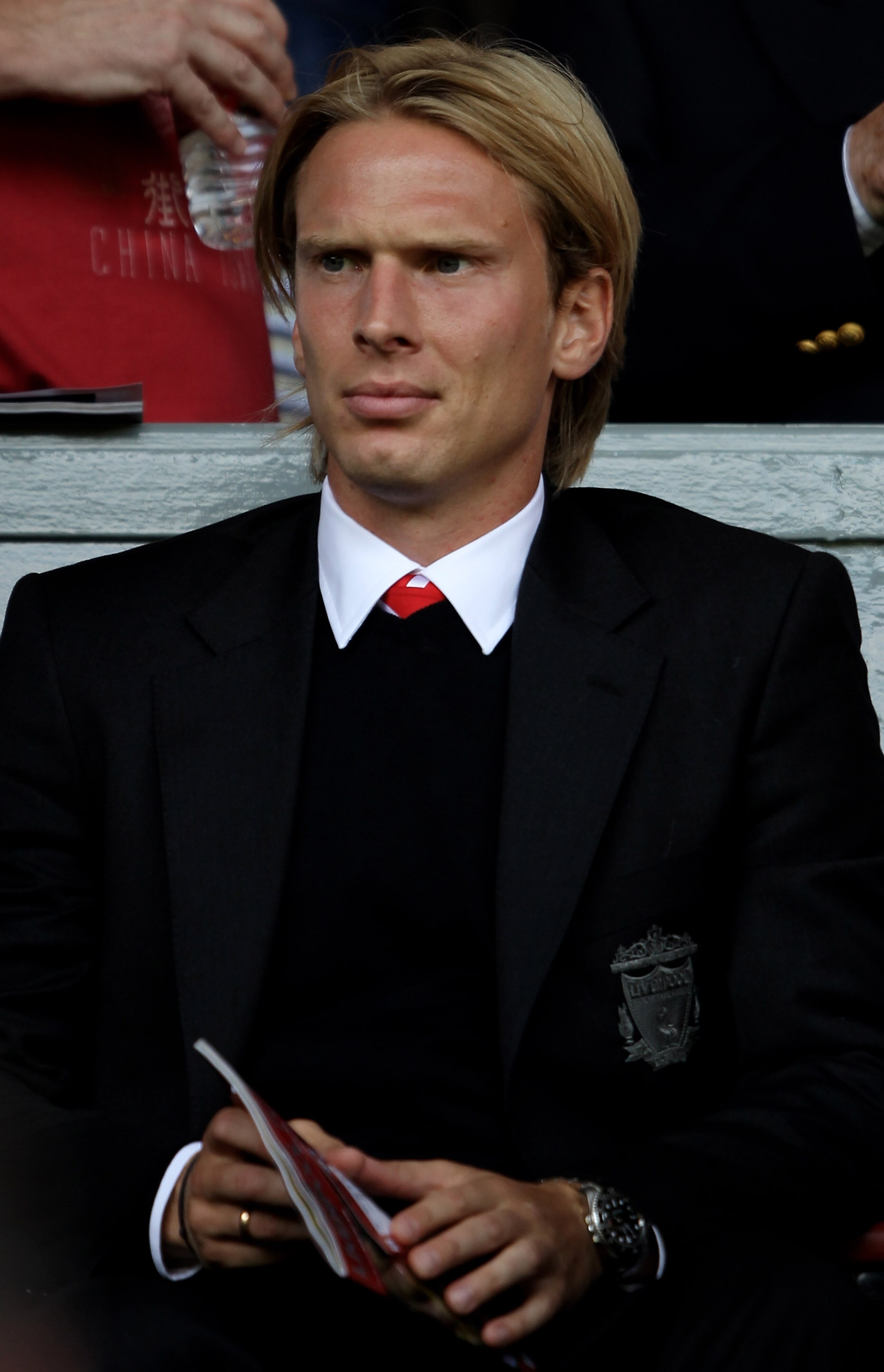 LIVERPOOL, ENGLAND - AUGUST 15:  Christian Poulsen of Liverpool looks on during the Barclays Premier League match between Liverpool and Arsenal at Anfield on August 15, 2010 in Liverpool, England. (Photo by Clive Brunskill/Getty Images)