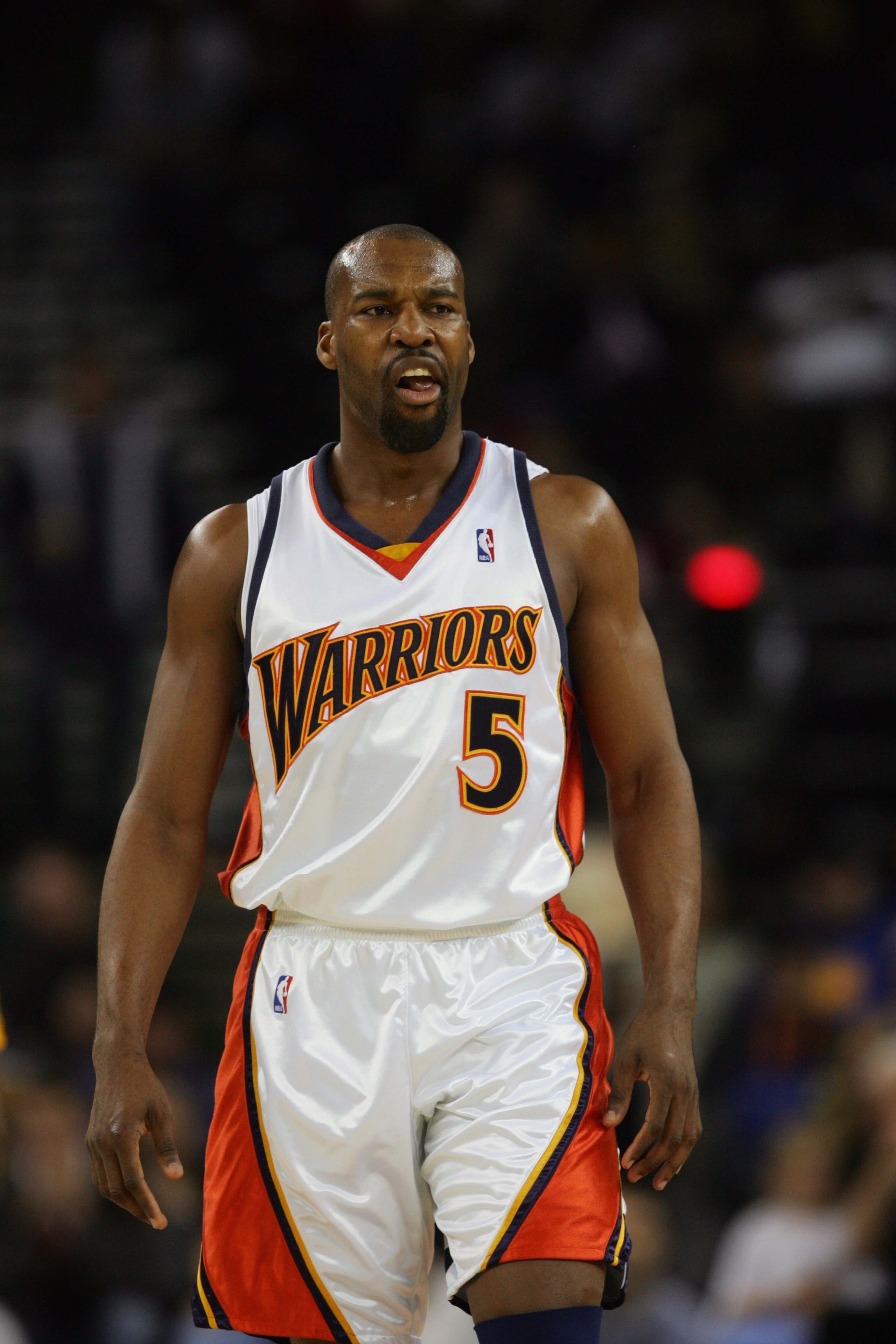 OAKLAND, CA - DECEMBER 9:  Baron Davis #5 of the Golden State Warriors looks on during a game against the New Orleans/Oklahoma City Hornets at Oracle Arena on December 9, 2006 in Oakland, California.  The Warriors won 101-80.  NOTE TO USER: User expressly