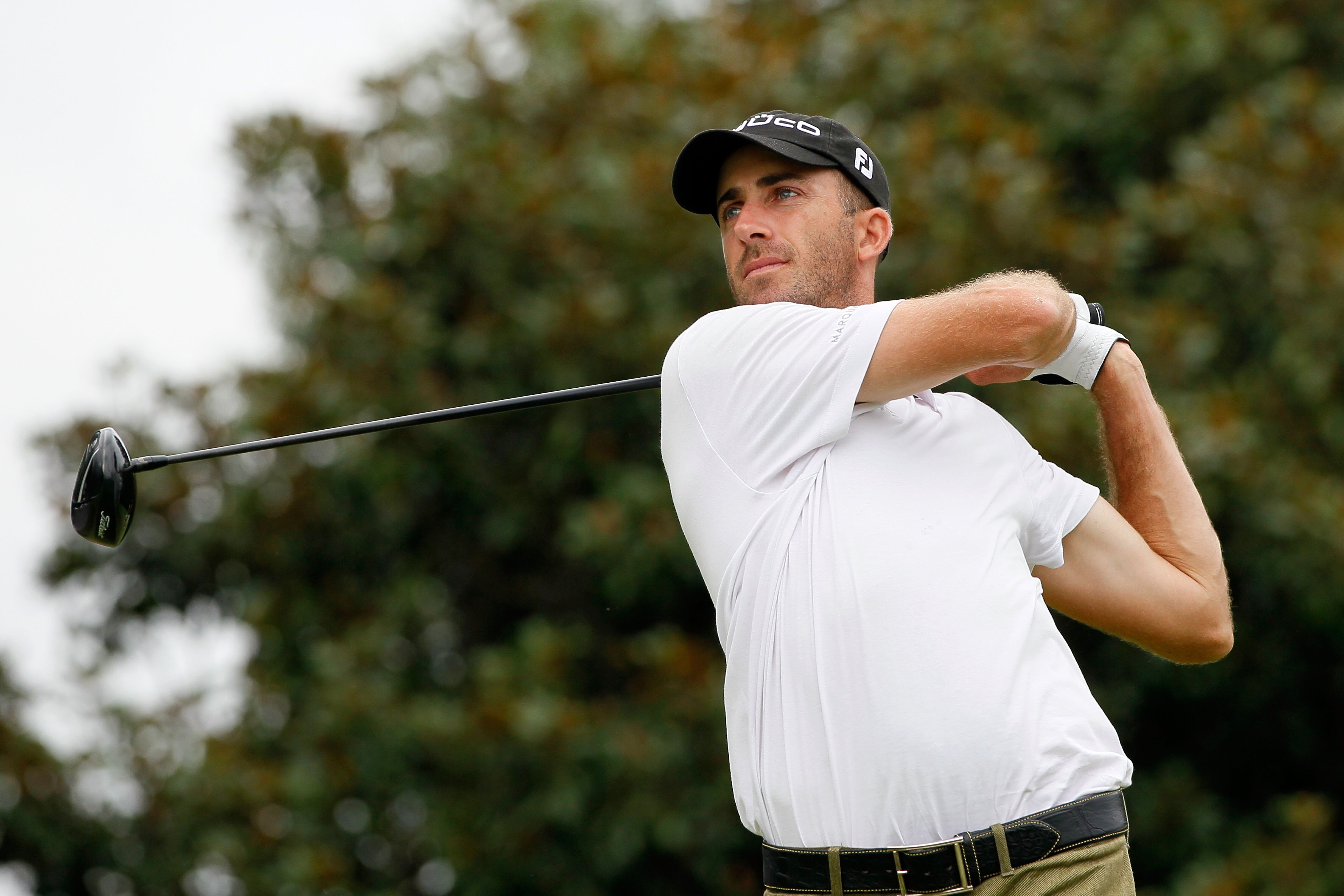 ATLANTA - SEPTEMBER 26:  Geoff Ogilvy of Australia tees off the fifth hole during the final round of THE TOUR Championship presented by Coca-Cola at East Lake Golf Club on September 26, 2010 in Atlanta, Georgia.  (Photo by Kevin C. Cox/Getty Images)