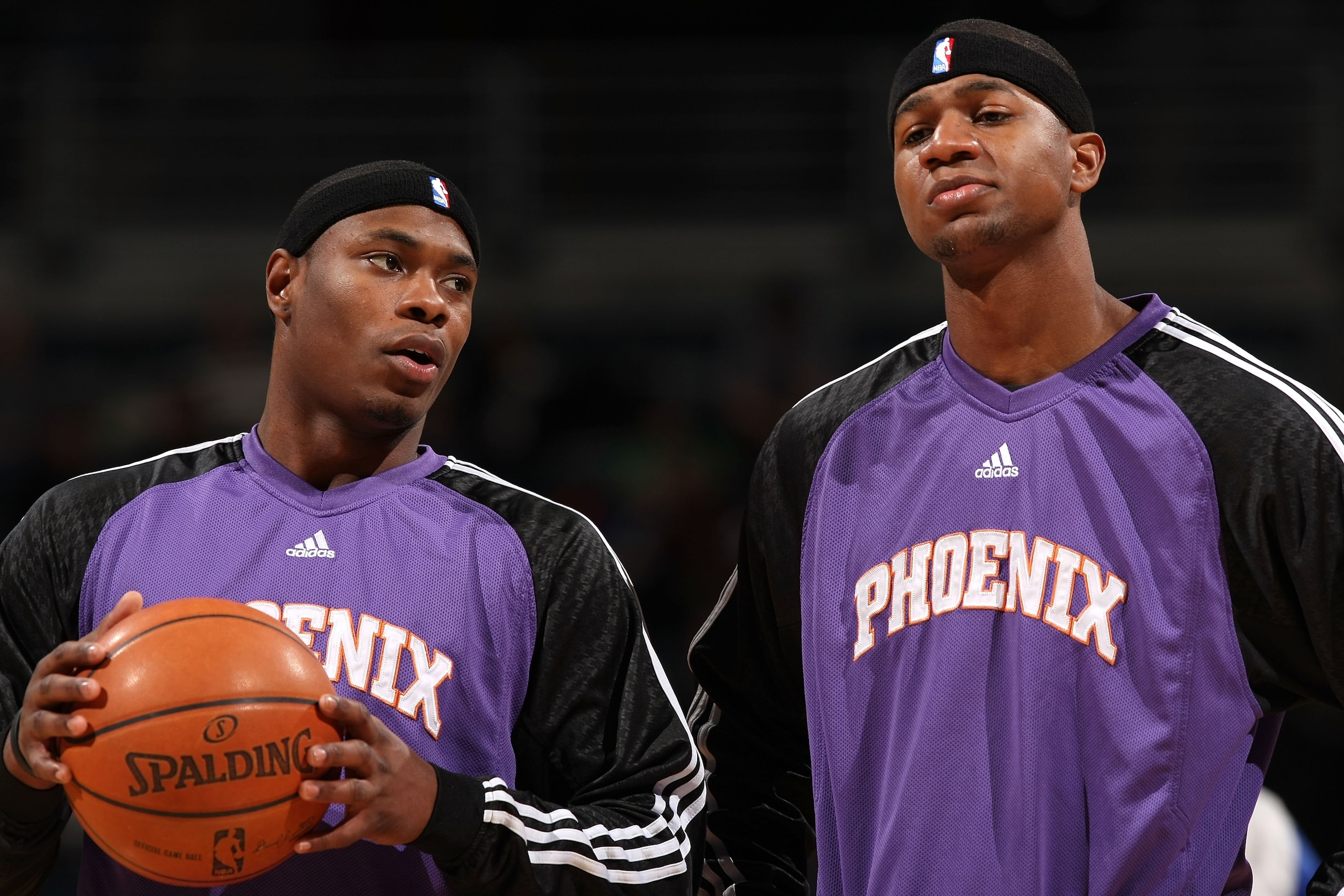 MILWAUKEE - JANUARY 22:  (L-R) Marcus Banks #2 and D.J. Strawberry #8 of the Phoenix Suns talk during warmups against the Milwaukee Bucks at the Bradley Center on January 22, 2008 in Milwaukee, Wisconsin. The Suns won 114-105. NOTE TO USER: User expressly