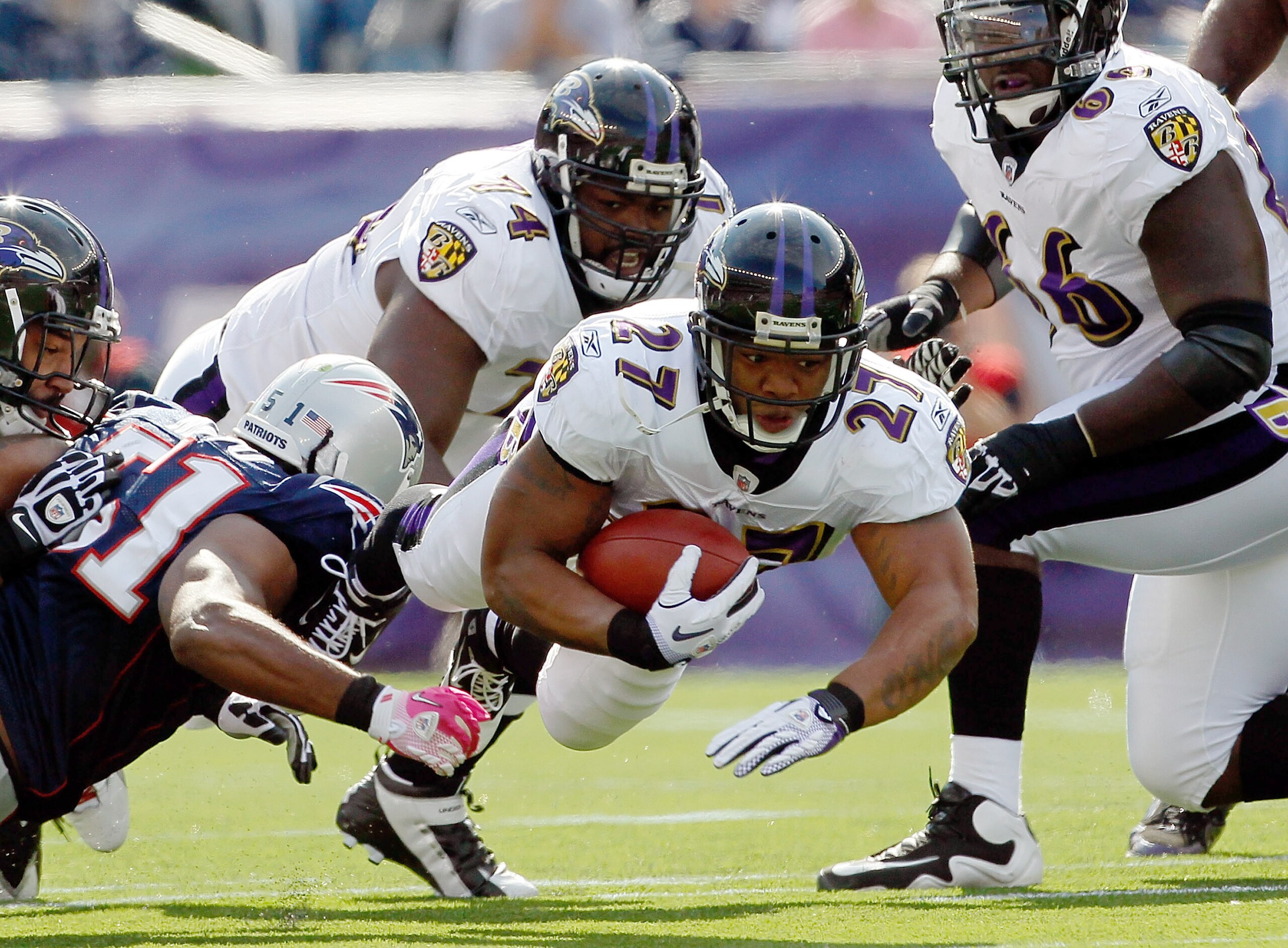 FOXBORO, MA - OCTOBER 17:  Ray Rice #27 of the Baltimore Ravens gains yards against the New England Patriots in the first half at Gillette Stadium on October 17, 2010 in Foxboro, Massachusetts. (Photo by Jim Rogash/Getty Images)