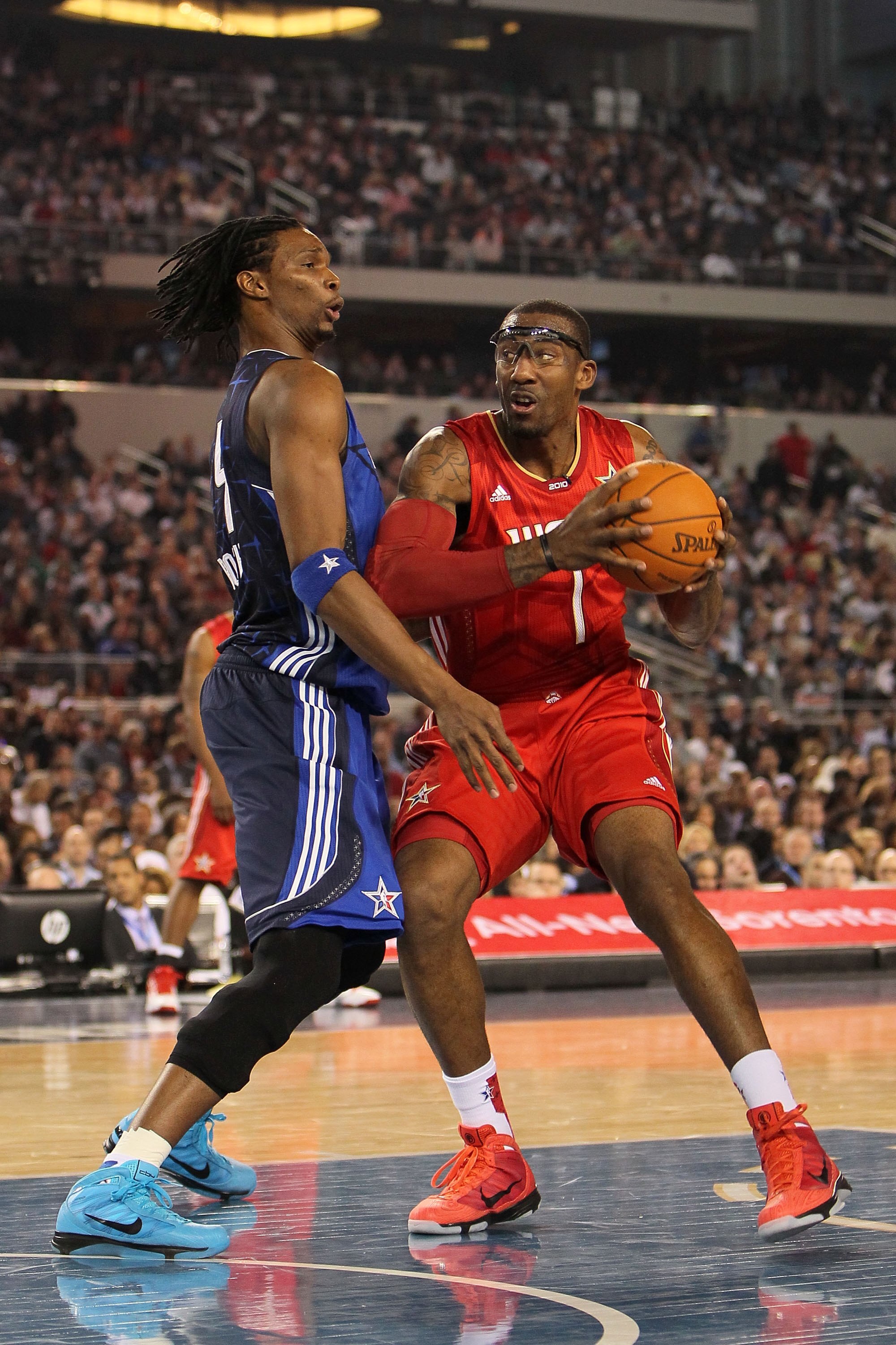 ARLINGTON, TX - FEBRUARY 14:  Amar'e Stoudemire #1 of the Western Conference looks to shoot against Chris Bosh #4 of the Eastern Conference during the NBA All-Star Game, part of 2010 NBA All-Star Weekend at Cowboys Stadium on February 14, 2010 in Arlingto