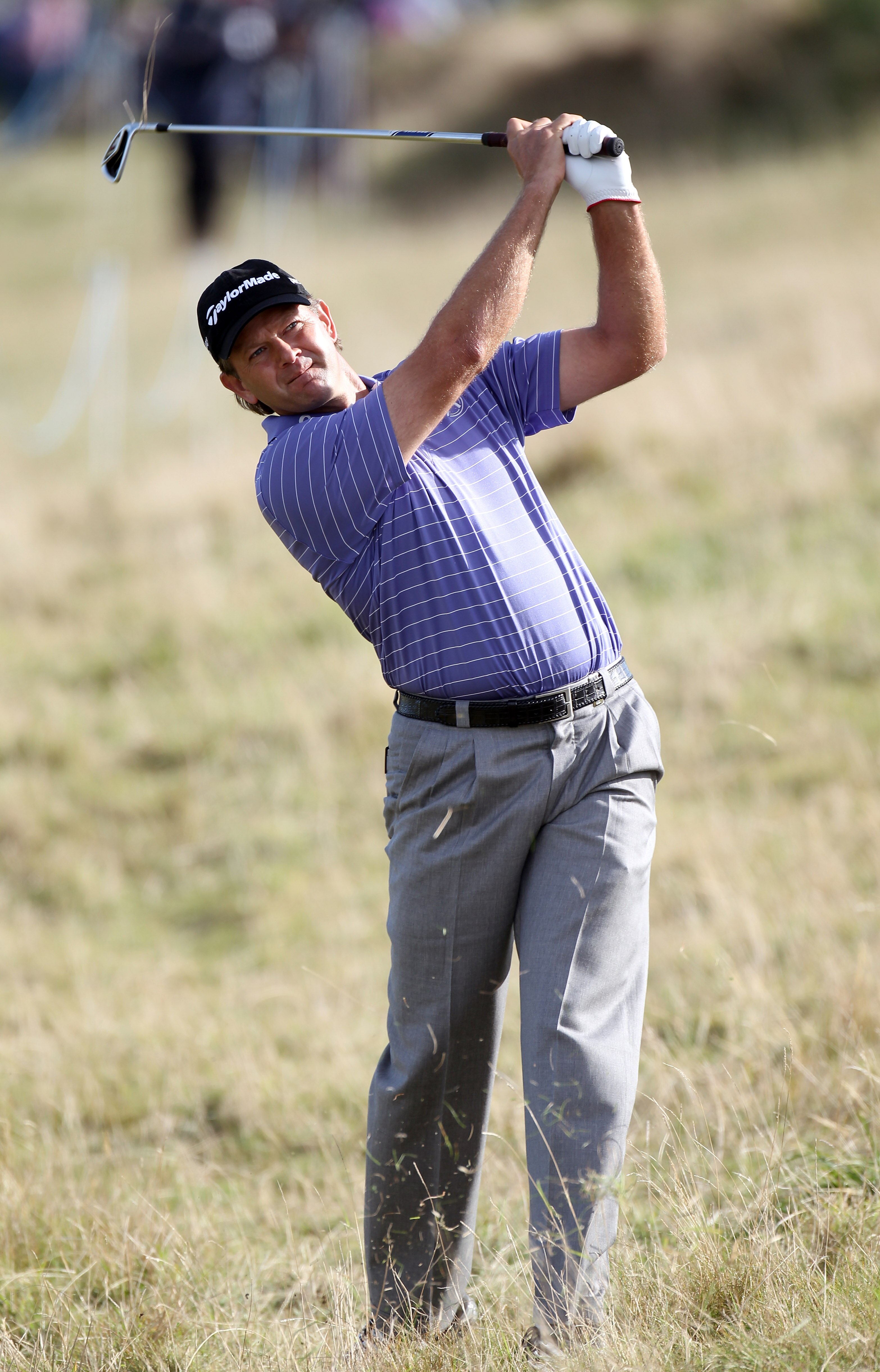 KINGSBARNS, SCOTLAND - OCTOBER 07:  Retief Goosen of South Africa plays his second shot on the nineth hole during the first round of The Alfred Dunhill Links Championship at Kingsbarns Golf Links on October 7, 2010 in Kingsbarns, Scotland.  (Photo by Ross