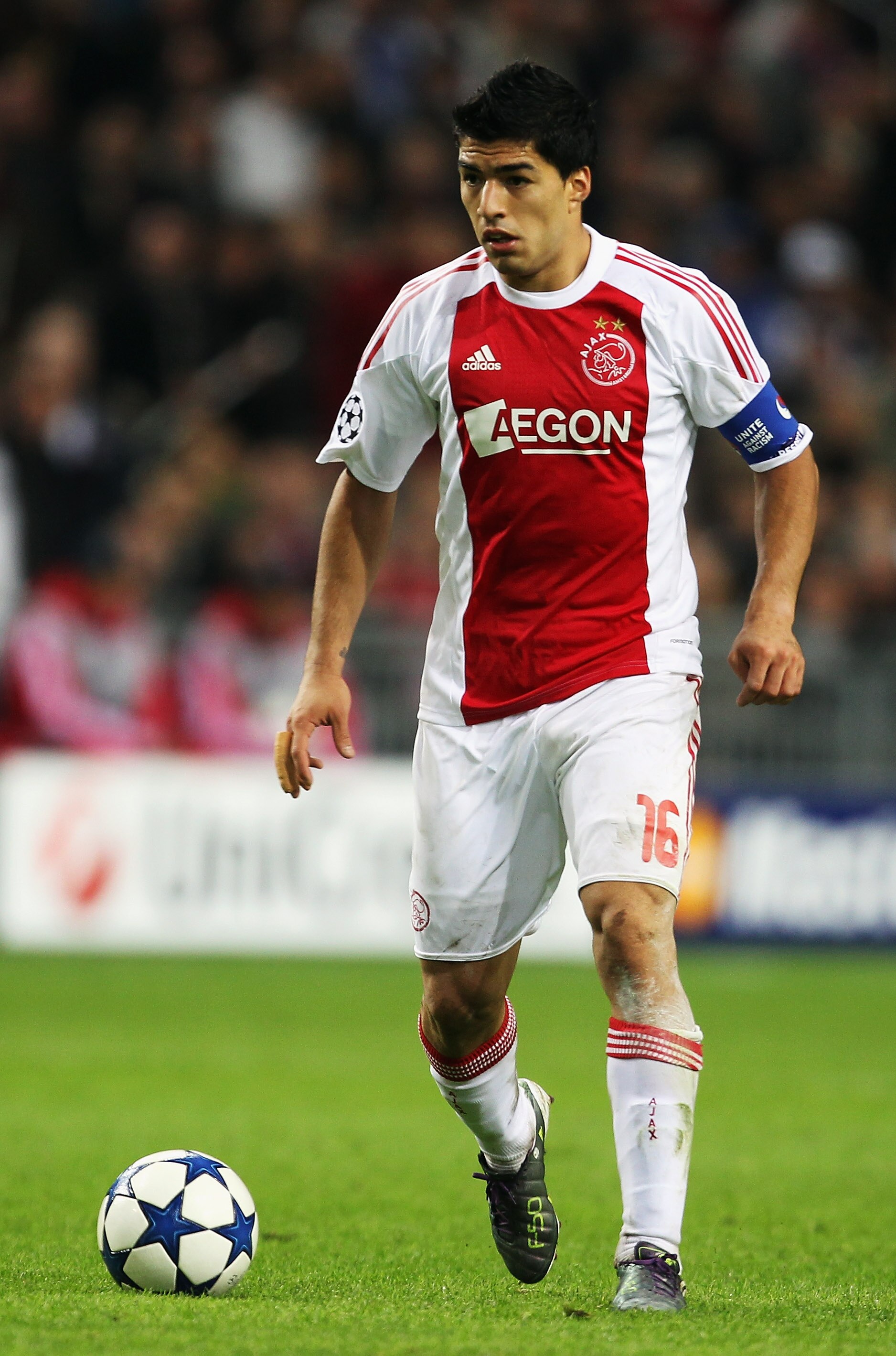 AMSTERDAM, NETHERLANDS - OCTOBER 19: Luis Suarez of AFC Ajax in action during the UEFA Champions League Group G match between AFC Ajax and AJ Auxerre at the Amsterdam ArenA on October 19, 2010 in Amsterdam, Netherlands. (Photo by Bryn Lennon/Getty Image AMSTERDAM, NETHERLANDS - OCTOBER 19: Luis Suarez of AFC Ajax in action during the UEFA Champions League Group G match between AFC Ajax and AJ Auxerre at the Amsterdam ArenA on October 19, 2010 in Amsterdam, Netherlands. (Photo by Bryn Lennon/Getty Image