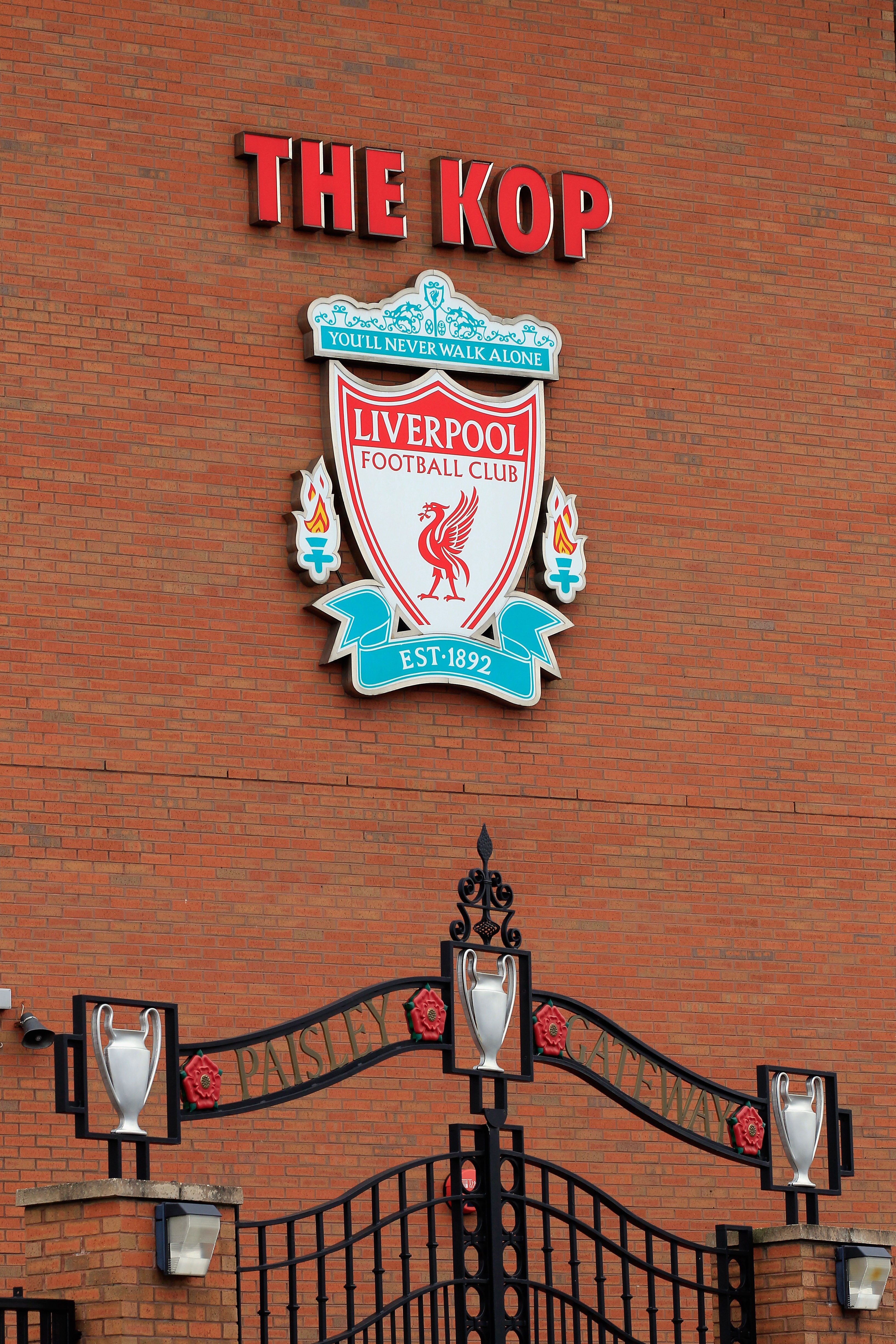 LIVERPOOL, ENGLAND - OCTOBER 15: A view of the Paisley Gateway at Anfield the home of Liverpool Football Club on October 15, 2010 in Liverpool, England. The future ownership of the famous football club had been subject to legal injunctions in the UK and LIVERPOOL, ENGLAND - OCTOBER 15: A view of the Paisley Gateway at Anfield the home of Liverpool Football Club on October 15, 2010 in Liverpool, England. The future ownership of the famous football club had been subject to legal injunctions in the UK and