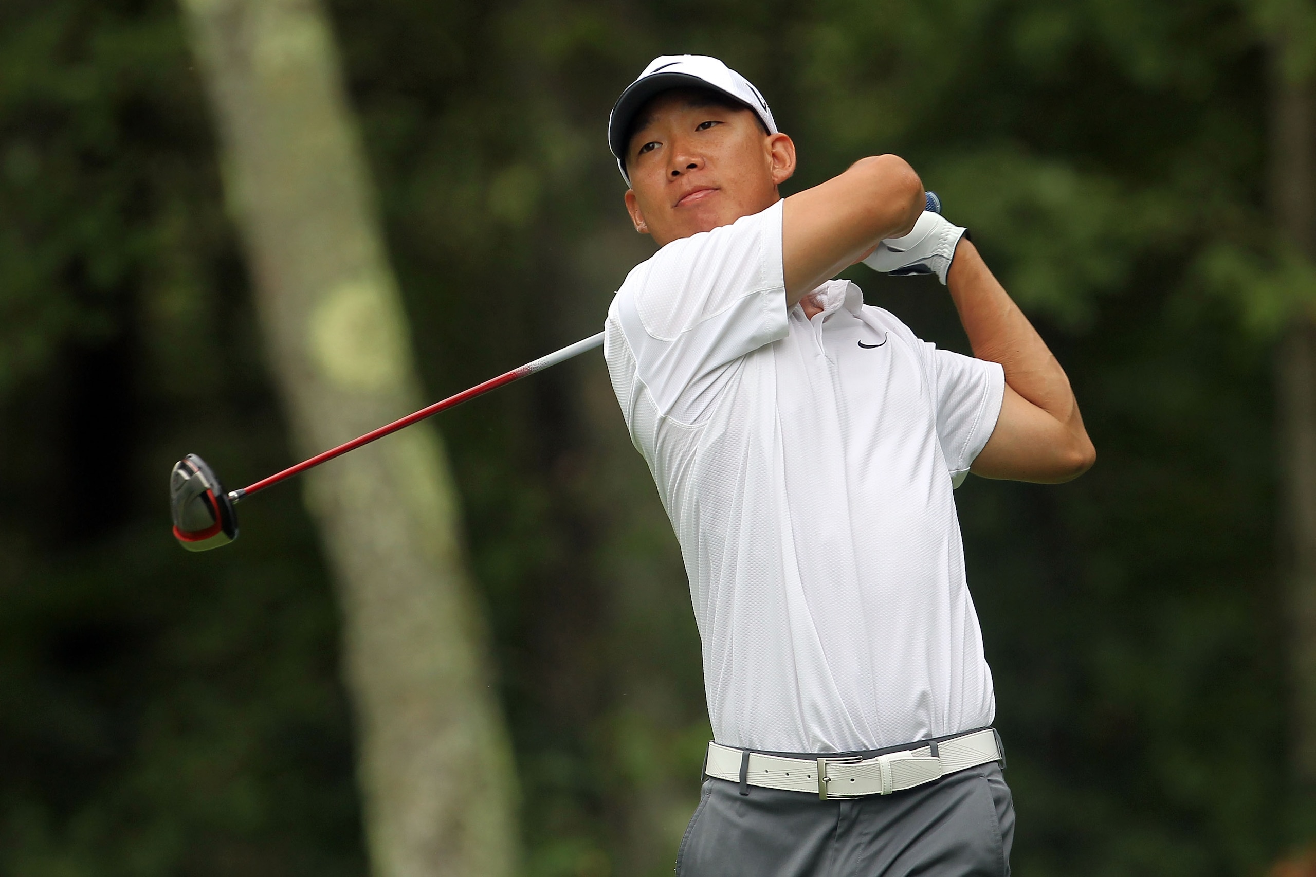 NORTON, MA - SEPTEMBER 03:  Anthony Kim hits a shot on the second hole during the first round of the Deutsche Bank Championship at TPC Boston on September 3, 2010 in Norton, Massachusetts.  (Photo by Mike Ehrmann/Getty Images)