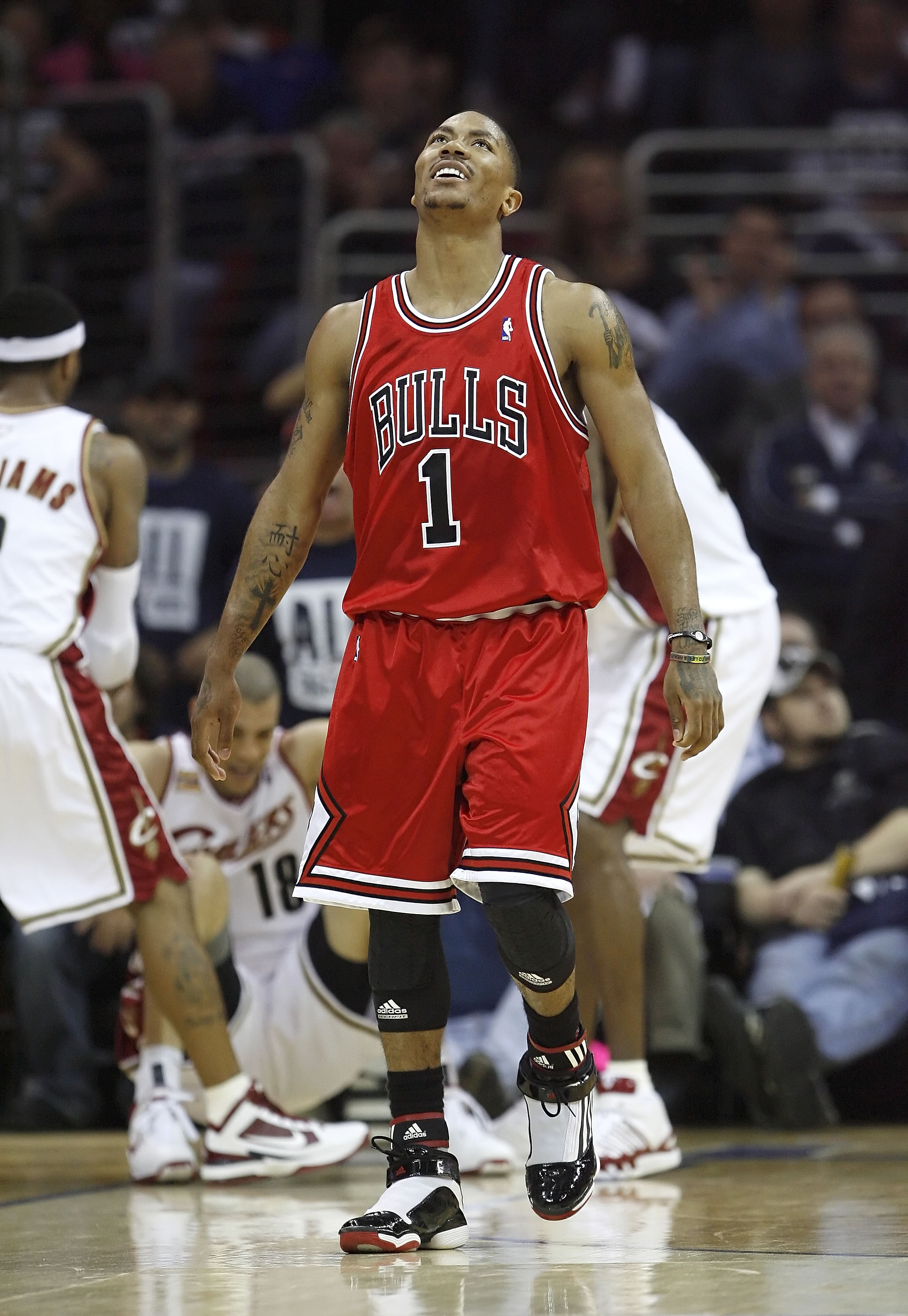 CLEVELAND - APRIL 17: Derrick Rose #1 of the Chicago Bulls reacts after being called for a foul against Anthony Parker #18 of the Cleveland Cavaliers in Game One of the Eastern Conference Quarterfinals during the 2010 NBA Playoffs at Quicken Loans Arena CLEVELAND - APRIL 17: Derrick Rose #1 of the Chicago Bulls reacts after being called for a foul against Anthony Parker #18 of the Cleveland Cavaliers in Game One of the Eastern Conference Quarterfinals during the 2010 NBA Playoffs at Quicken Loans Arena