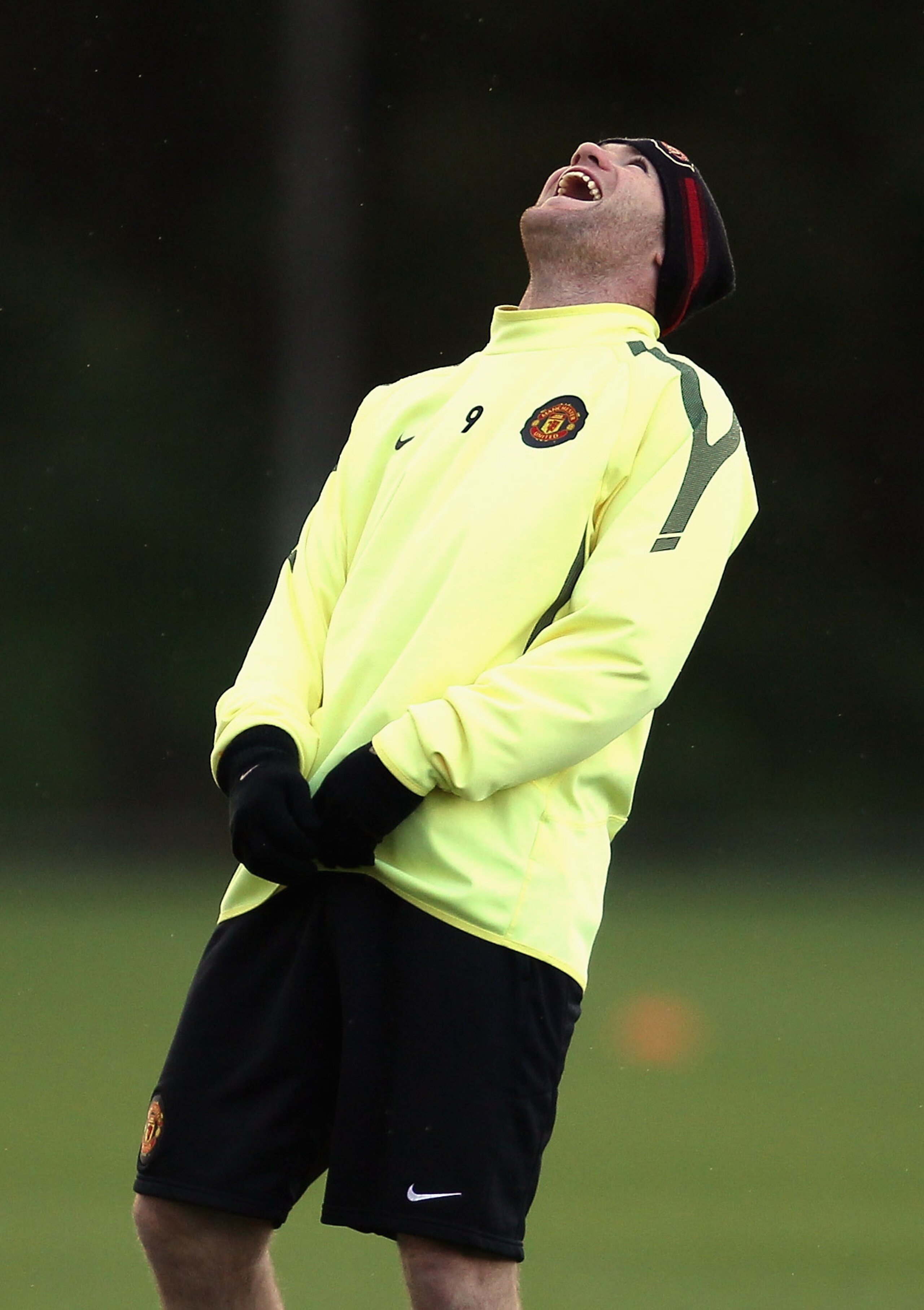 MANCHESTER, ENGLAND - OCTOBER 19:  Wayne Rooney of Manchester United enjoys a joke during a training session at the Carrington Training Complex on October 19, 2010 in Manchester, England.  (Photo by Alex Livesey/Getty Images)