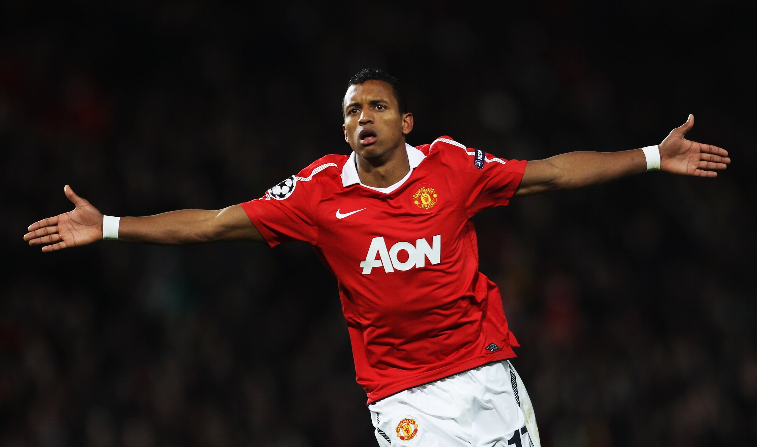 MANCHESTER, ENGLAND - OCTOBER 20:  Luis Nani of Manchester United celebrates as he scores their first goal during the UEFA Champions League Group C match between Manchester United and Bursaspor Kulubu at Old Trafford on October 20, 2010 in Manchester, Eng
