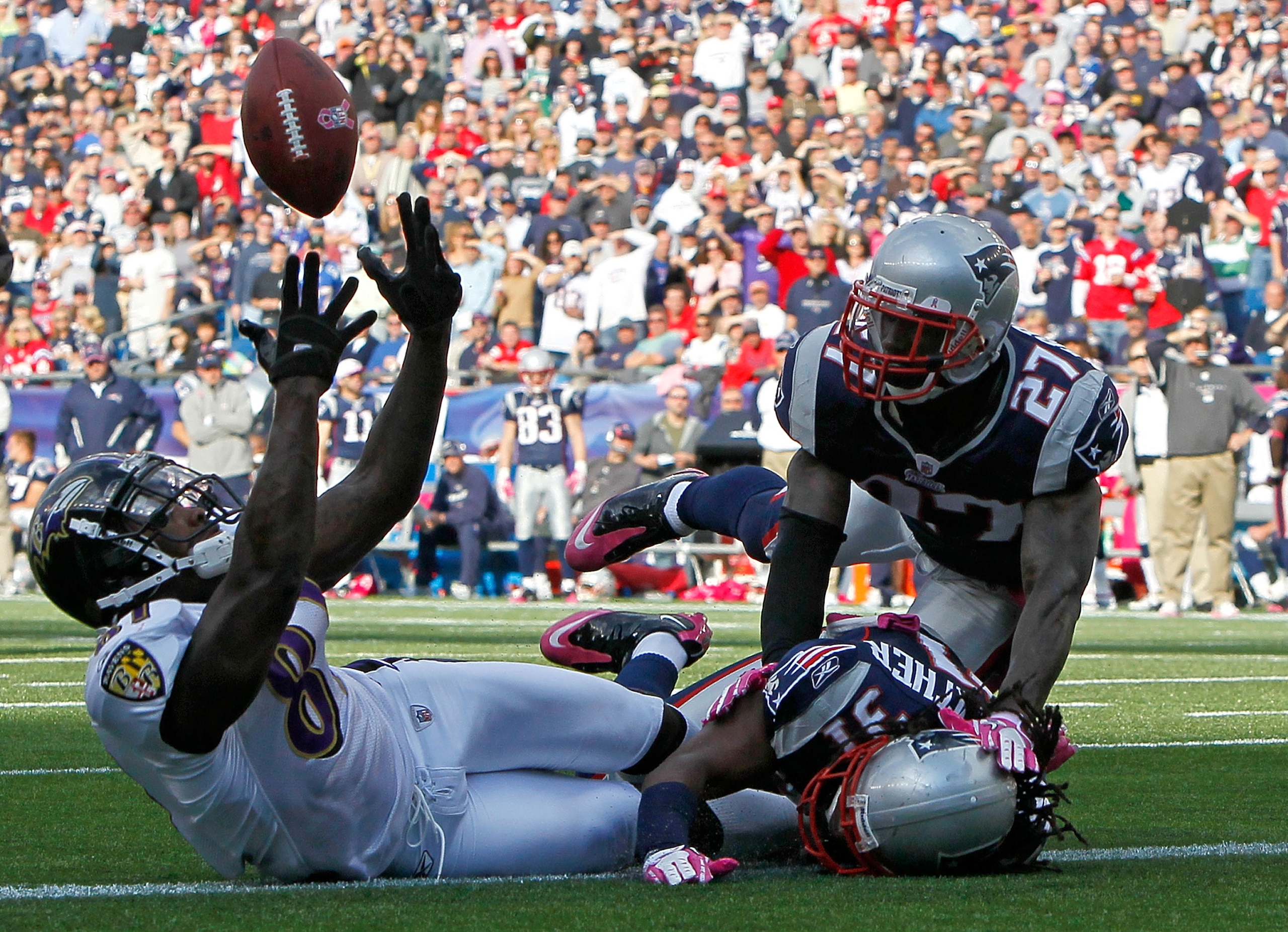 FOXBORO, MA - OCTOBER 17:  Anquan Boldin #81 of the Baltimore Ravens is unable catch the football under the pressure of Brandon Meriweather #31 and Kyle Arrington #27 of the New England Patriots in the second half at Gillette Stadium on October 17, 2010 i