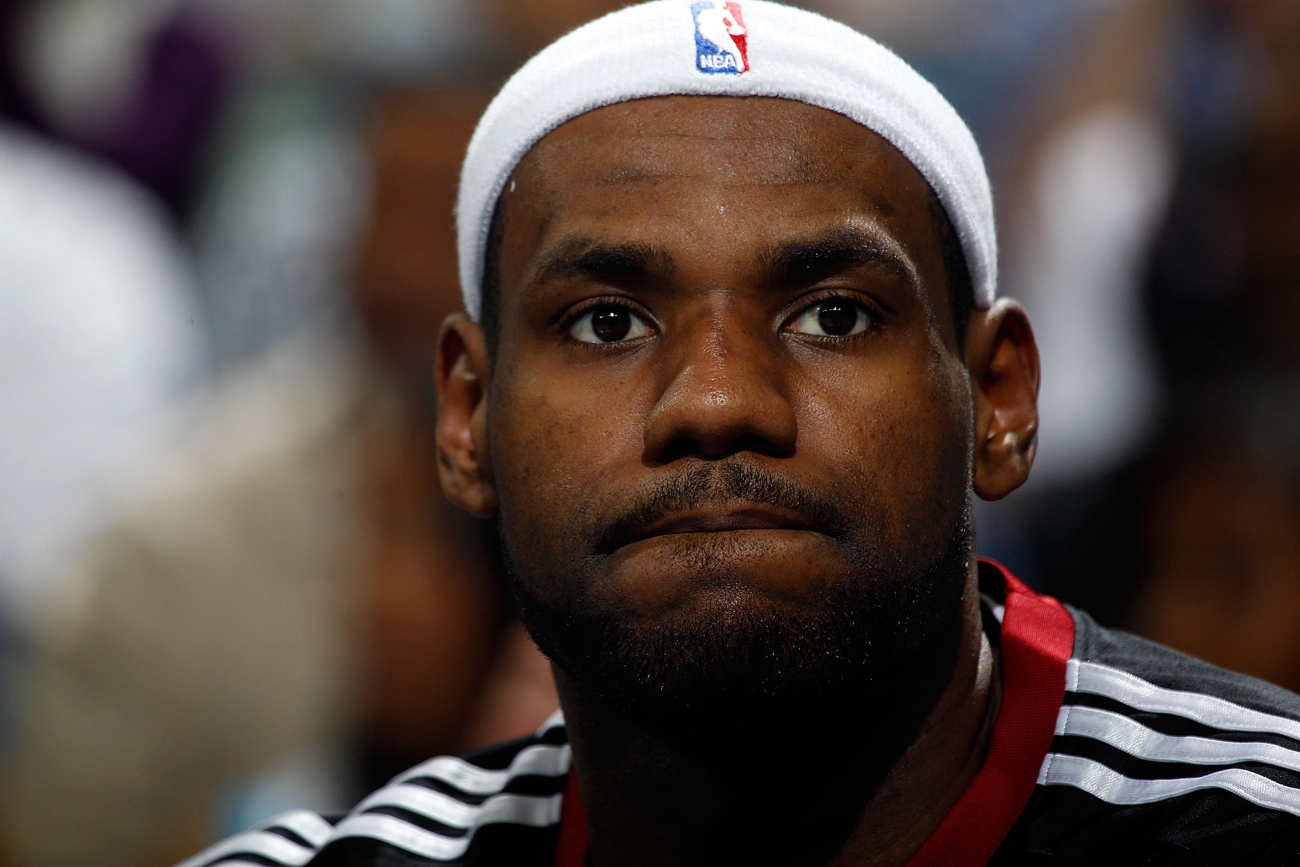 NEW ORLEANS - OCTOBER 13:  Lebron James #6  of the Miami Heat sits on the bench during the game against the New Orleans Hornets at the New Orleans Arena on October 13, 2010 in New Orleans, Louisiana.  NOTE TO USER: User expressly acknowledges and agrees t
