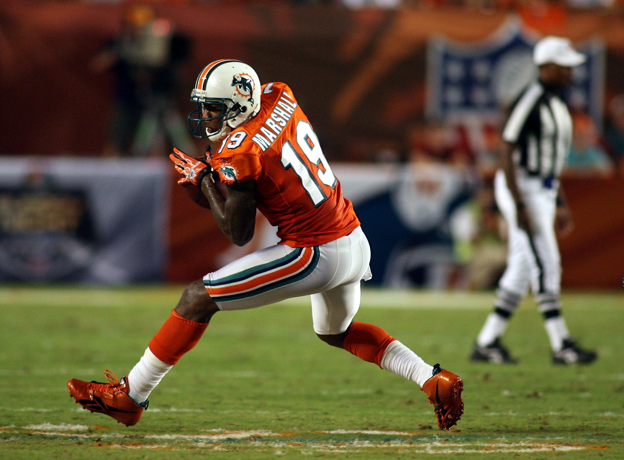 MIAMI - SEPTEMBER 26: Receiver Brandon Marshall #19 of the Miami Dolphins shouts during a game against the New York Jets at Sun Life Stadium on September 26, 2010 in Miami, Florida. (Photo by Marc Serota/Getty Images)