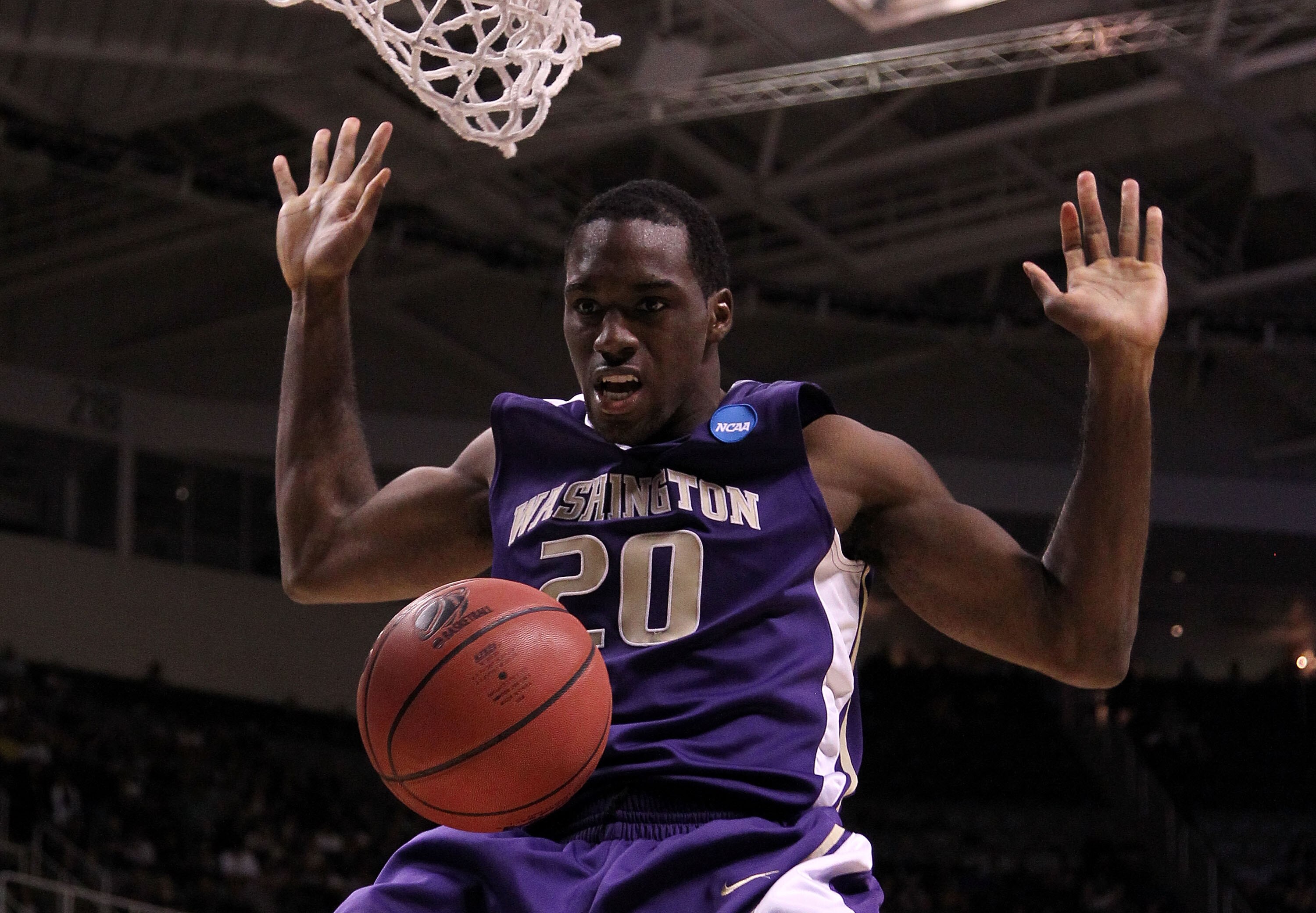 SAN JOSE, CA - MARCH 20:  Forward Quincy Pondexter #20 of the Washington Huskies dunks the ball against the New Mexico Lobos during the second round of the 2010 NCAA men's basketball tournament at HP Pavilion on March 20, 2010 in San Jose, California.  (P