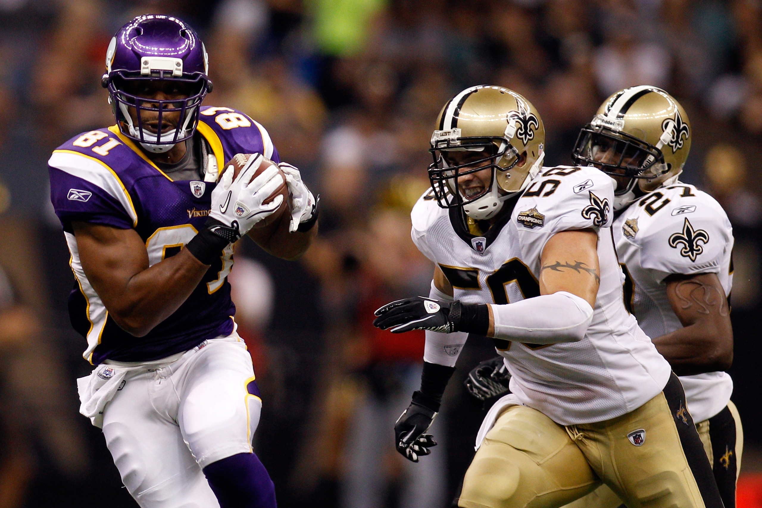NEW ORLEANS - SEPTEMBER 09: Visanthe Shiancoe #81 of the Minnesota Vikings runs for yards after the catch the New Orleans Saints at Louisiana Superdome on September 9, 2010 in New Orleans, Louisiana. (Photo by Chris Graythen/Getty Images)