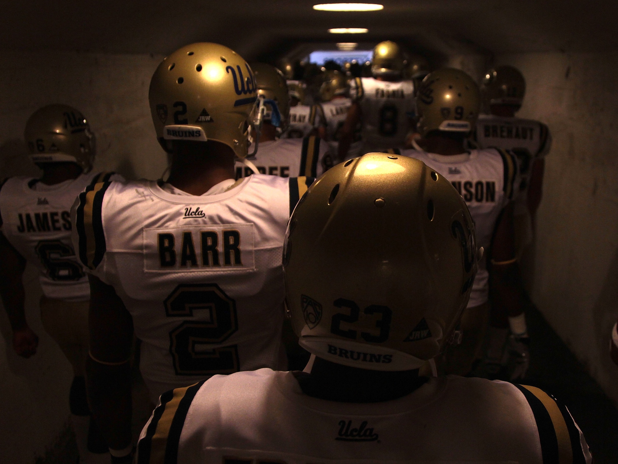 BERKELEY, CA - OCTOBER 09: Members of the UCLA Bruins enter the field against the California Golden Bears at California Memorial Stadium on October 9, 2010 in Berkeley, California. (Photo by Jed Jacobsohn/Getty Images) BERKELEY, CA - OCTOBER 09: Members of the UCLA Bruins enter the field against the California Golden Bears at California Memorial Stadium on October 9, 2010 in Berkeley, California. (Photo by Jed Jacobsohn/Getty Images)