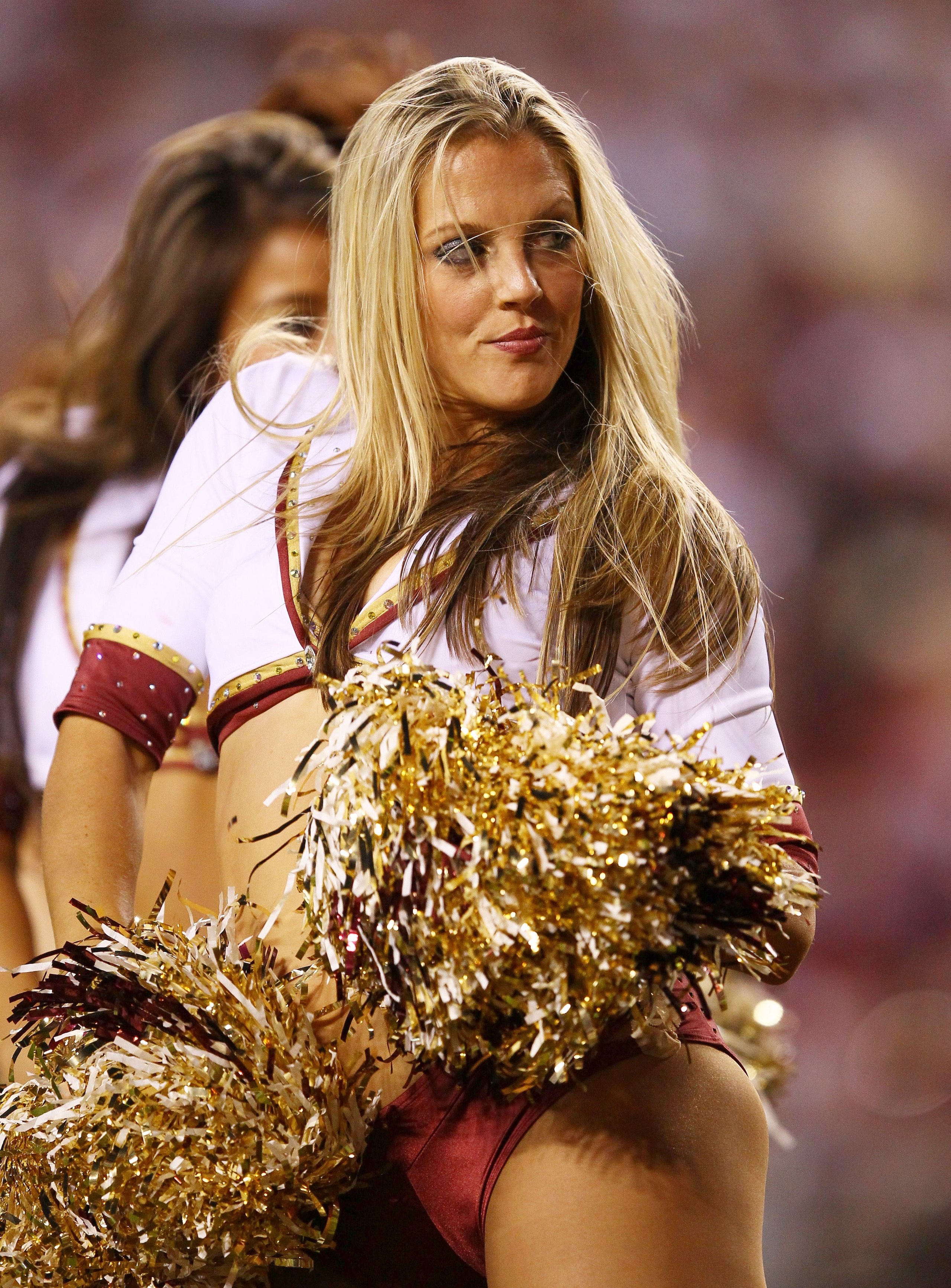LANDOVER, MD - OCTOBER 17:  A Washington Redskins cheerleader performs during a game against the Indianapolis Colts at FedEx Field on October 17, 2010 in Landover, Maryland. The Colts won the game 27-24.  (Photo by Win McNamee/Getty Images)