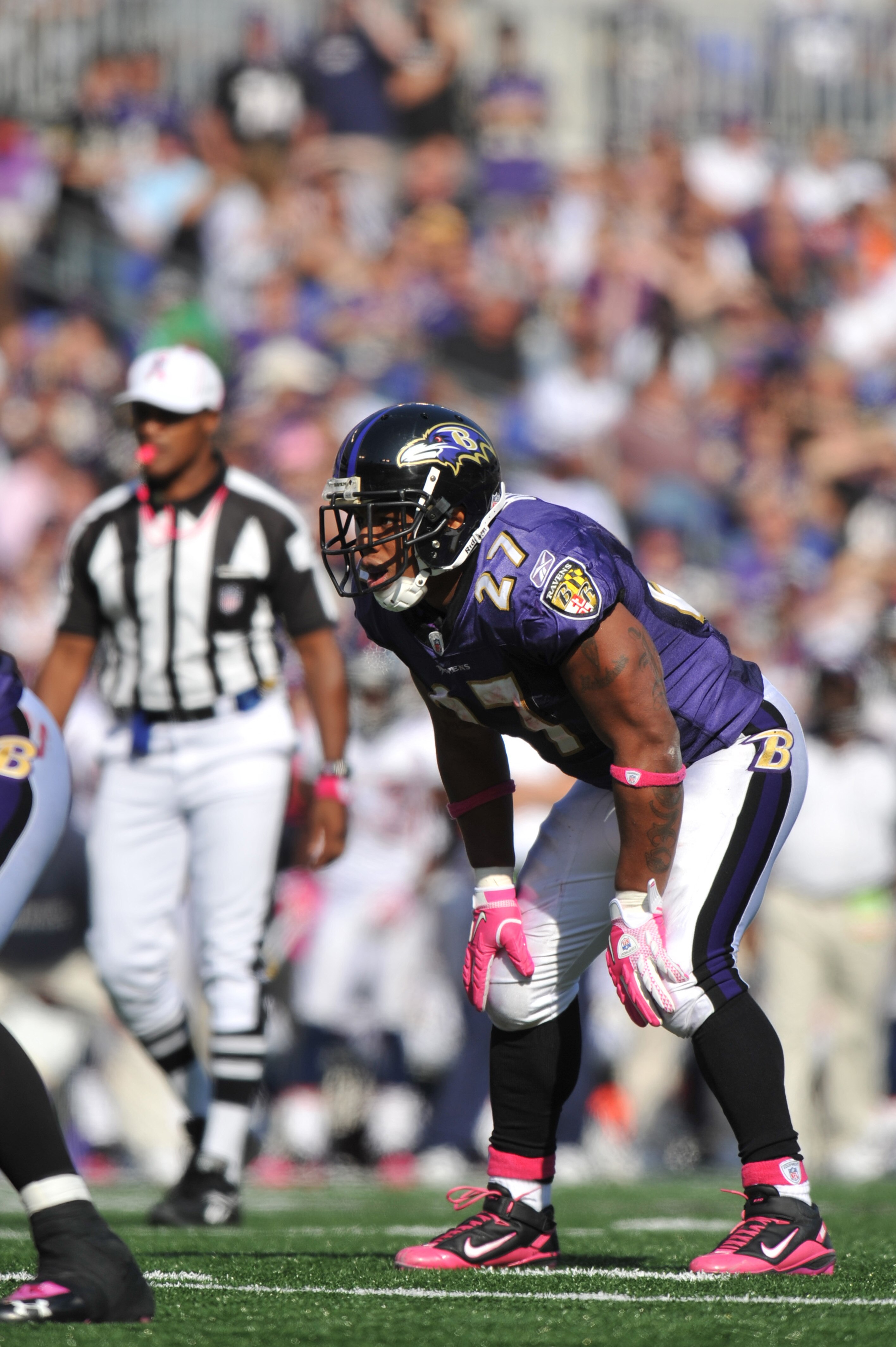 BALTIMORE, MD - OCTOBER 10: Ray Rice #27 of the Baltimore Ravens awaits the snap against the Denver Broncos at M&T Bank Stadium on October 10, 2010 in Baltimore, Maryland. Players wore pink in recognition of Breast Cancer Awareness Month. The Ravens defea